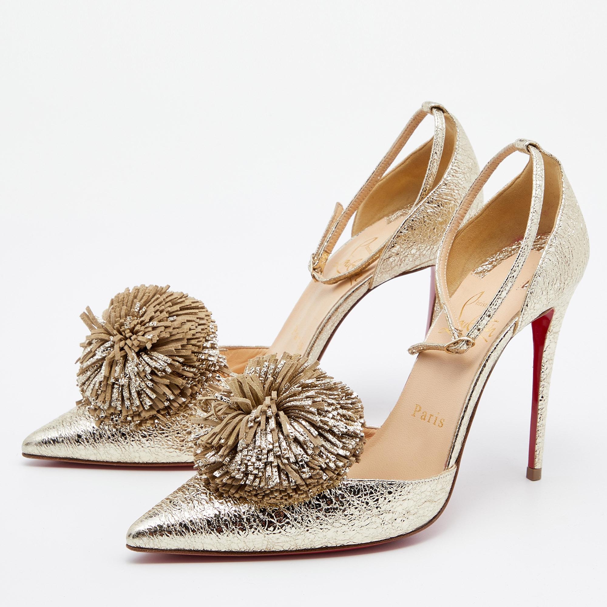 

Christian Louboutin Metallic Gold Leather Tsarou Pom Pom Pointed Toe Ankle Strap Sandals Size