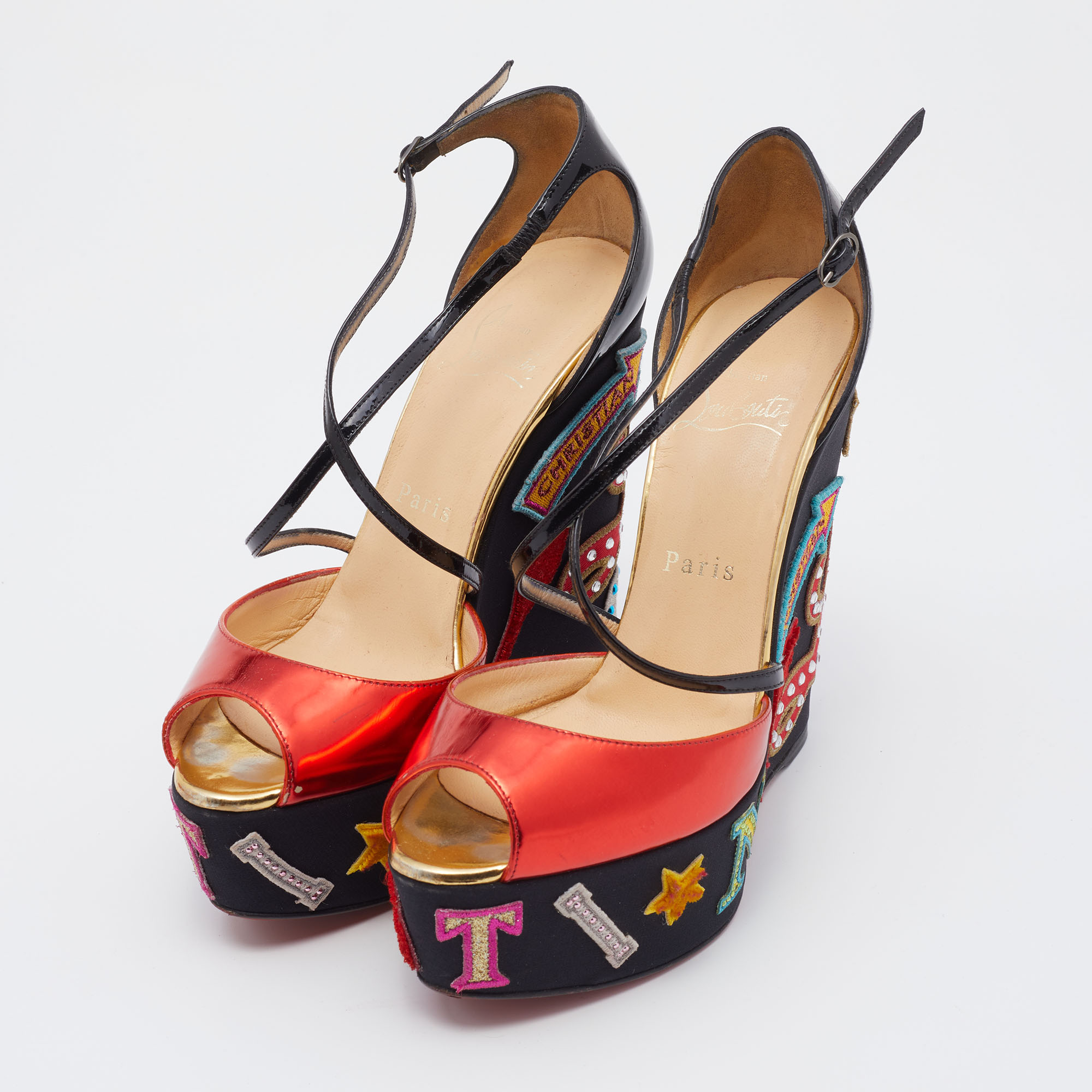 

Christian Louboutin Red/Black Patent And Leather Loubi Zeppa Crisscross Wedges Sandals Size