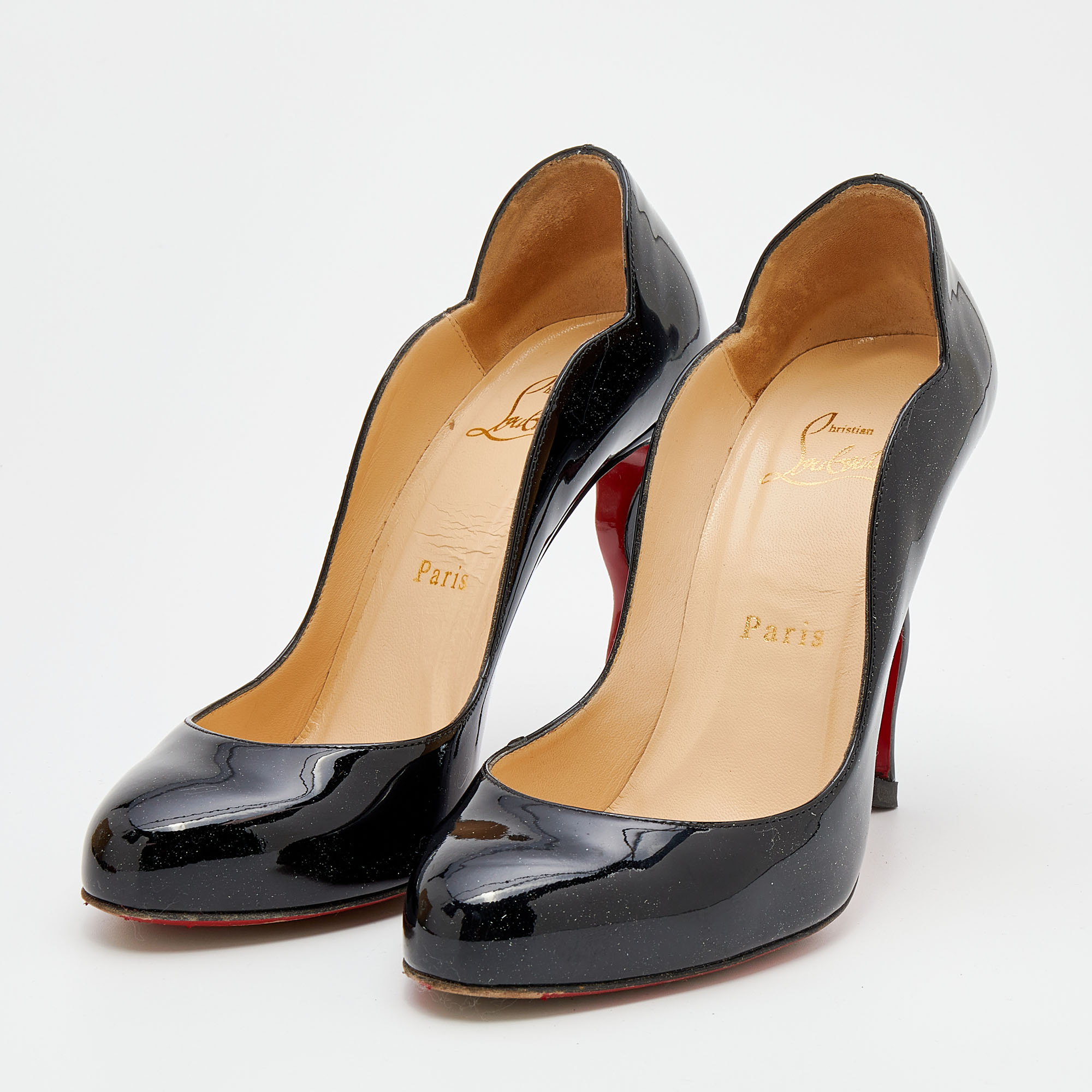 

Christian Louboutin Black Patent Leather Wavy Dolly Pumps Size