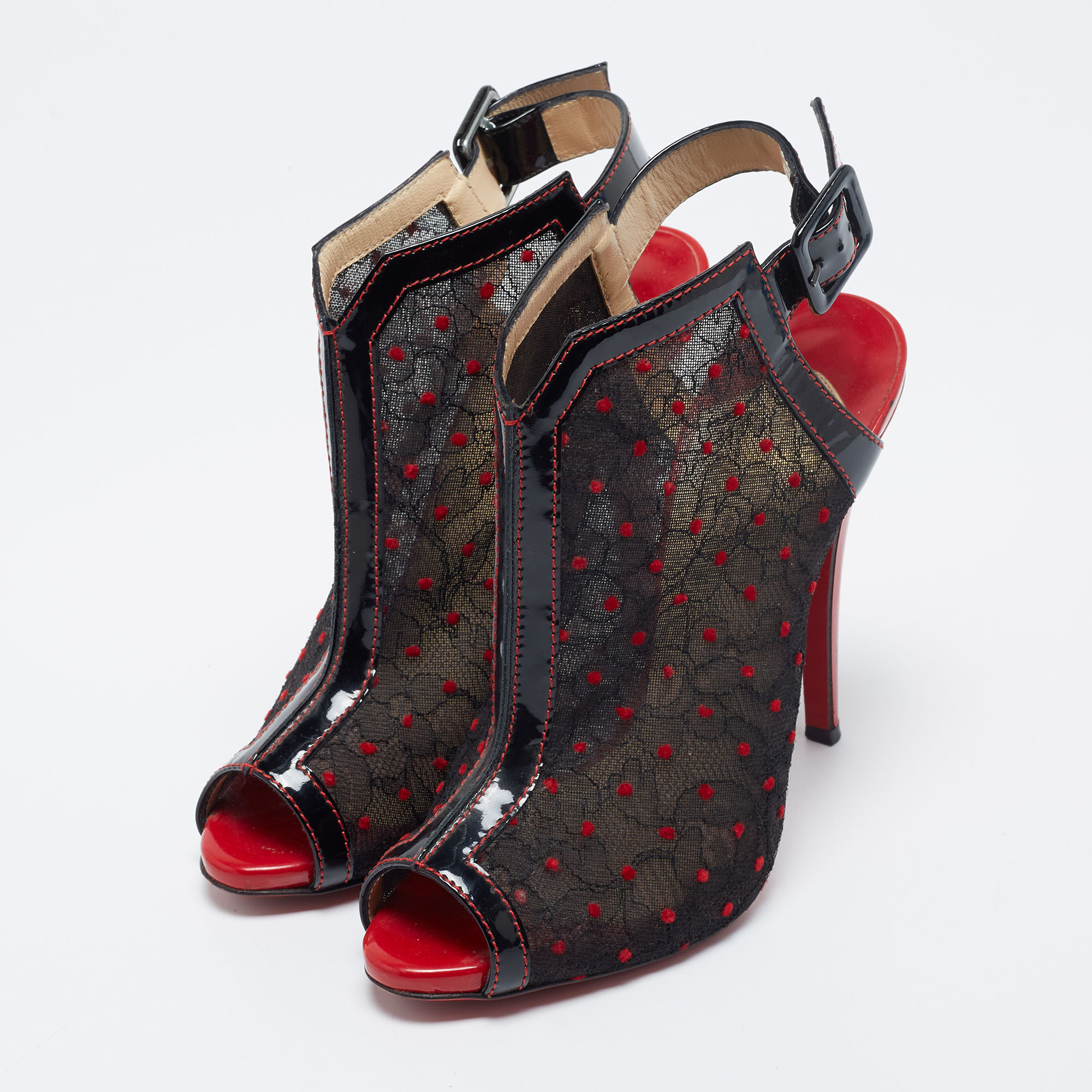 

Christian Louboutin Black Floral Lace And Patent Leather Catchiste Slingback Sandals Size