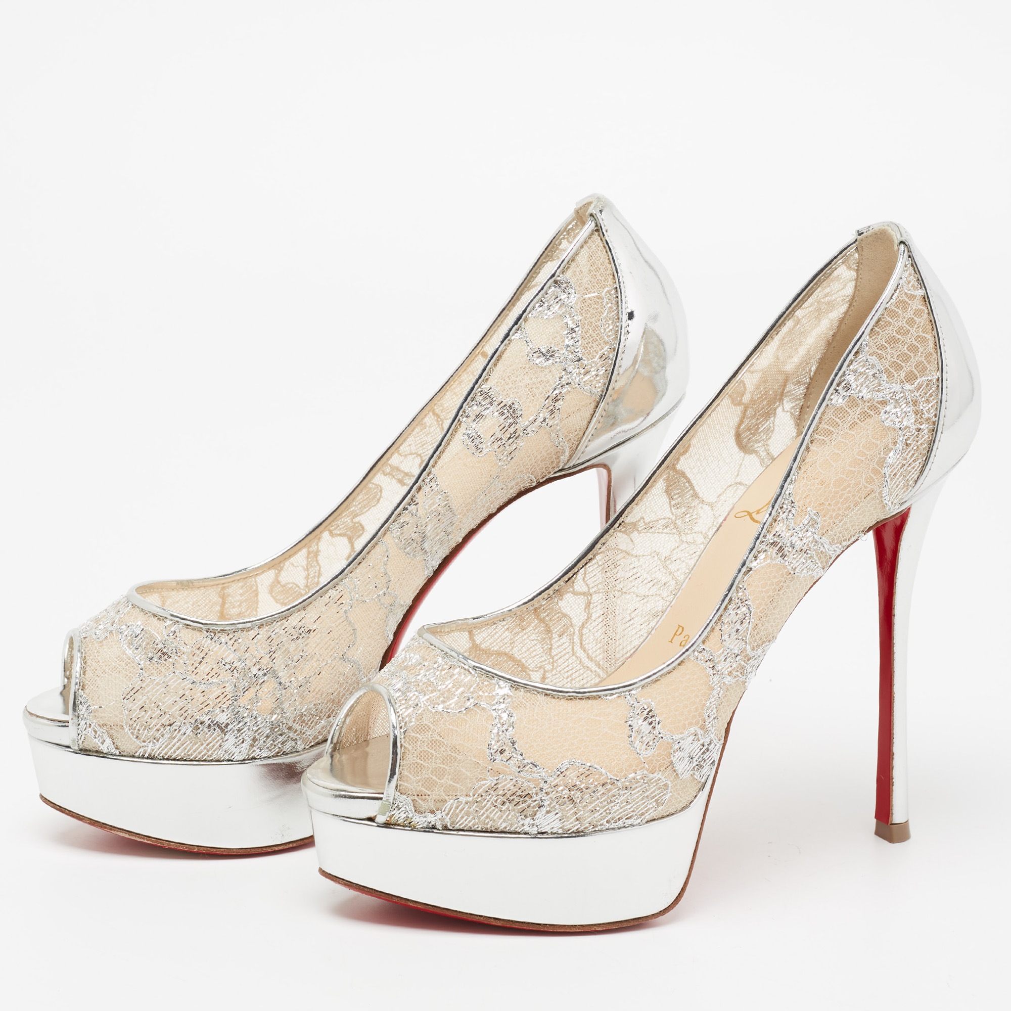

Christian Louboutin Metallic Silver Lace And Leather Fetish Platform Pumps Size