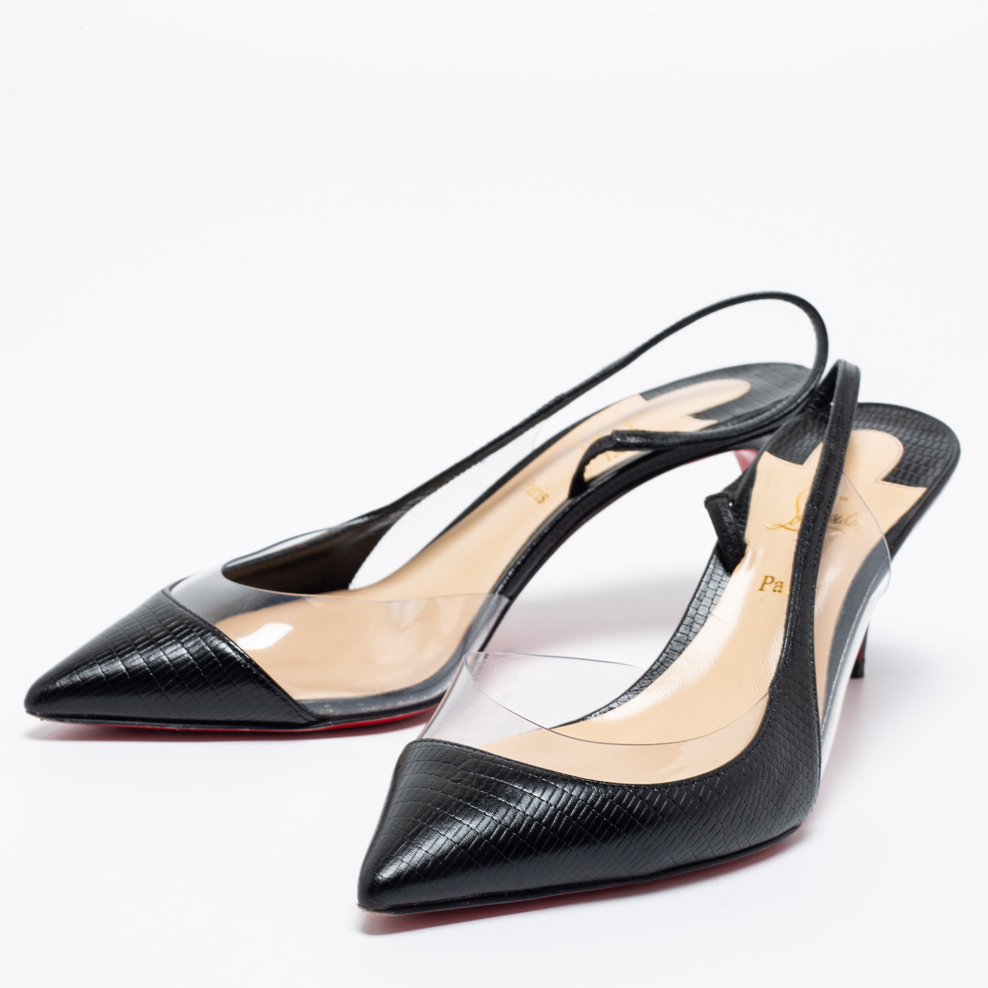 

Christian Louboutin Black Leather And PVC Pointed Toe Slingback Sandals Size