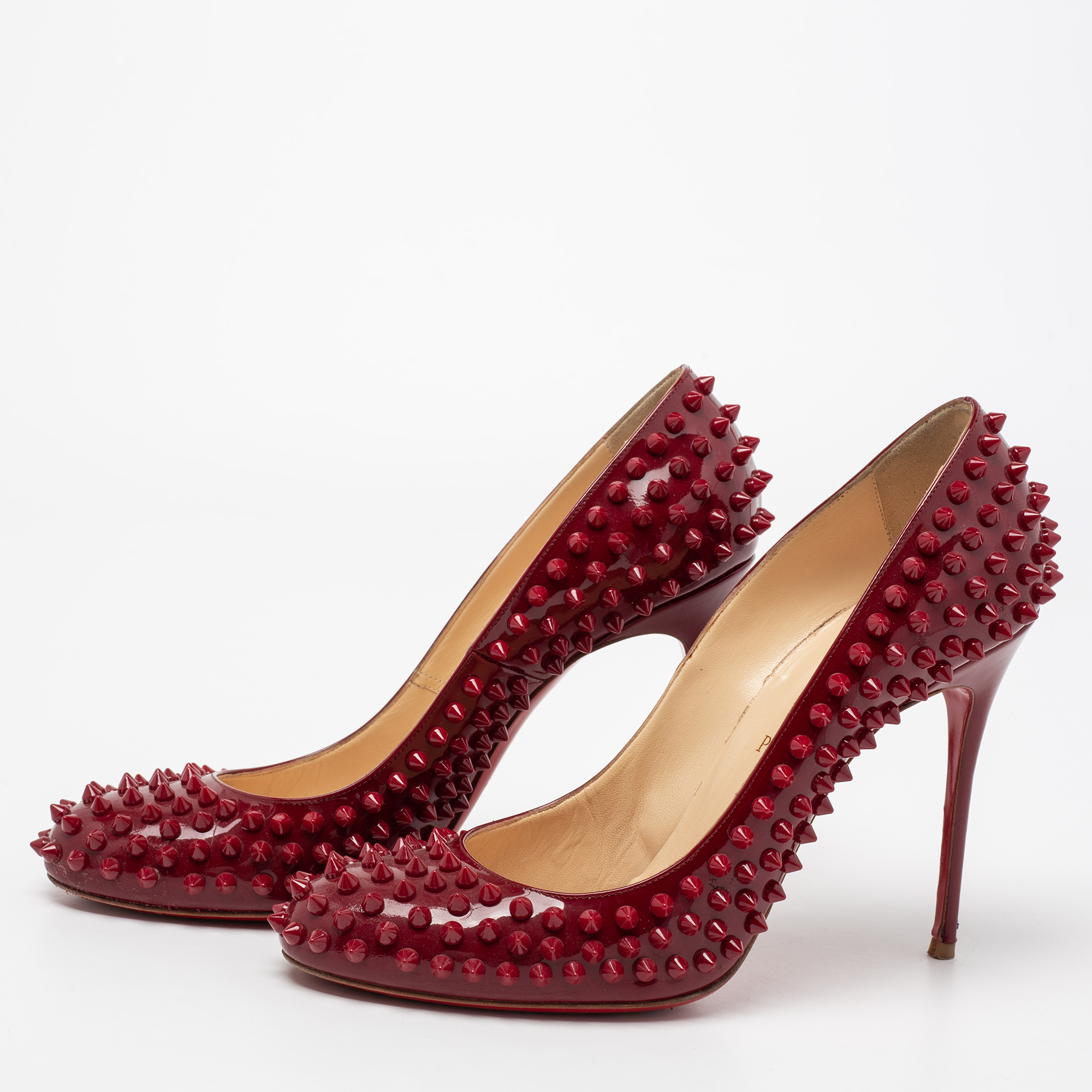 

Christian Louboutin Burgundy Patent Leather Fifi Spikes Pumps Size