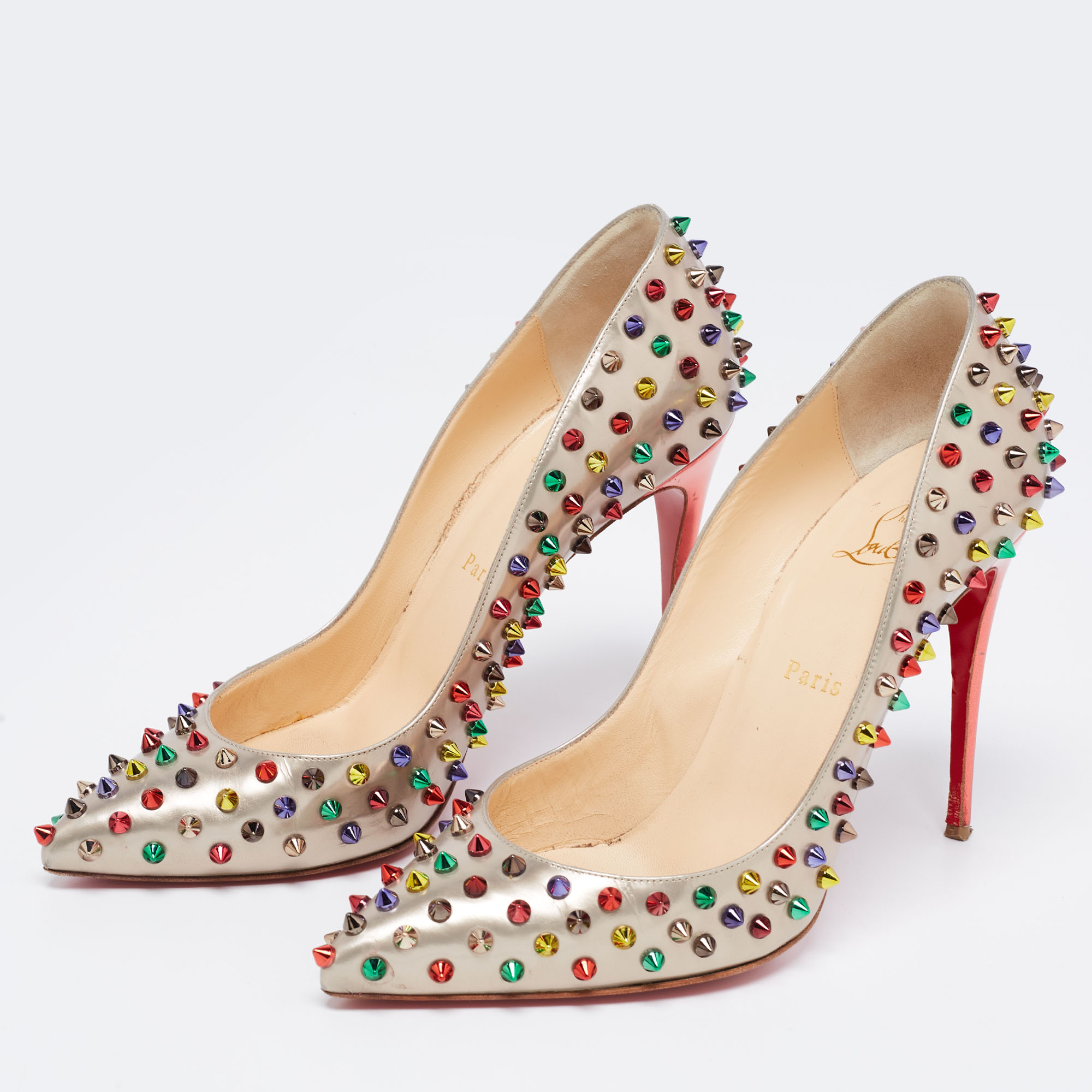 

Christian Louboutin Grey Leather Follies Spikes Pumps Size