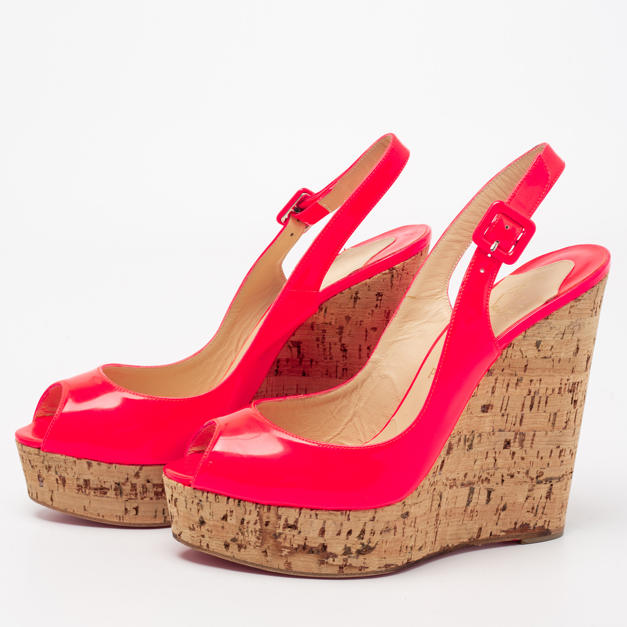 

Christian Louboutin Neon Pink Leather Une Plume Peep-Toe Cork Wedge Sandals Size