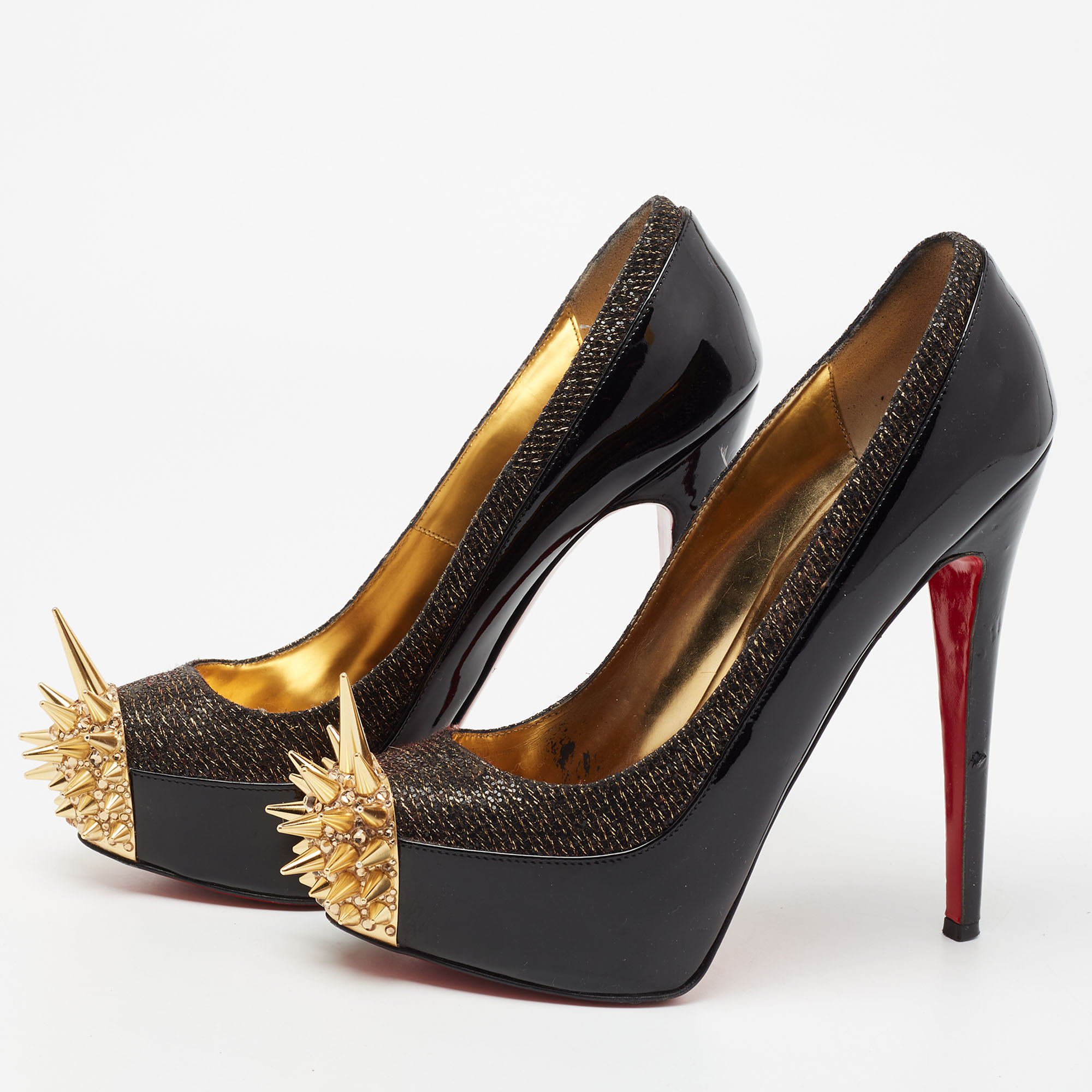 

Christian Louboutin Black/Gold Patent Leather And Lamé Fabric Asteroid Spike Platform Pumps Size