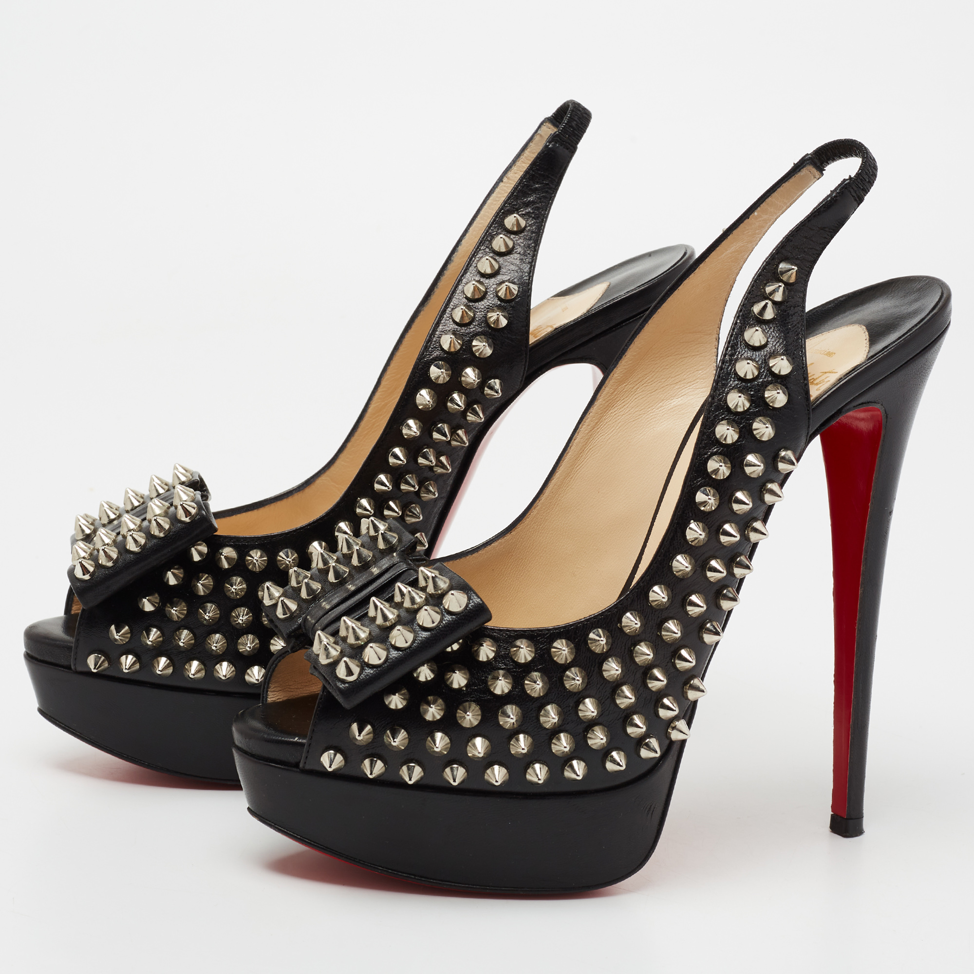 

Christian Louboutin Black Leather Clou Noeud Studded Slingback Sandals Size