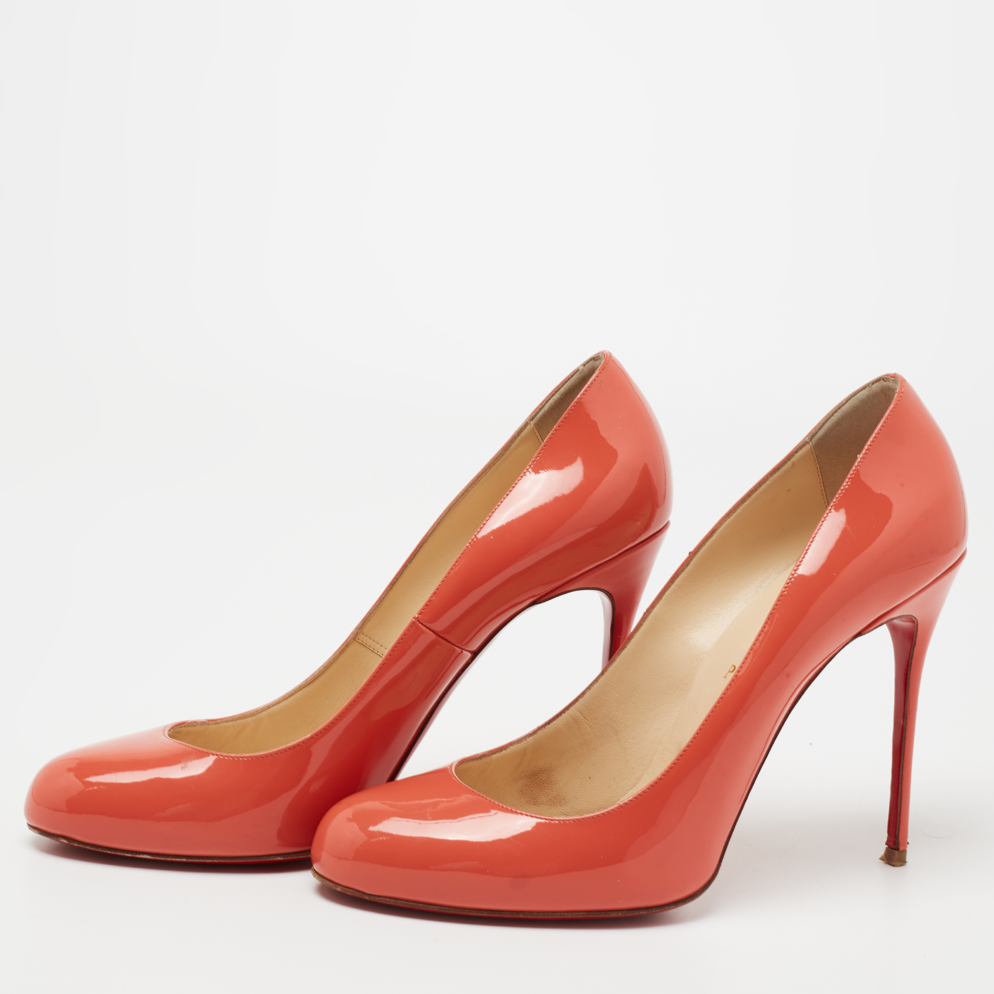 

Christian Louboutin Coral Pink Patent Leather Fifi Pumps Size