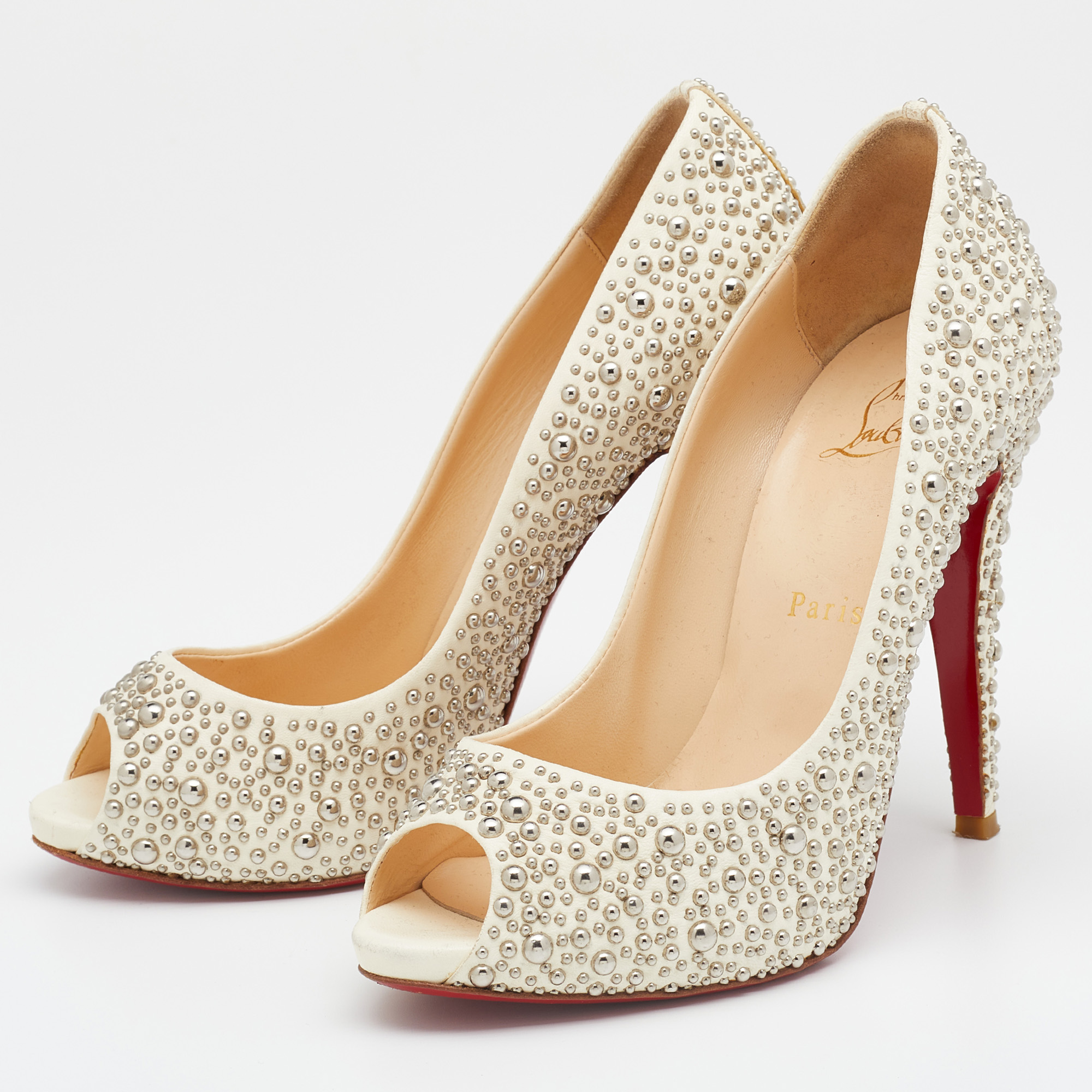 

Christian Louboutin Cream Leather Studded Studio Peep Toe Pumps Size