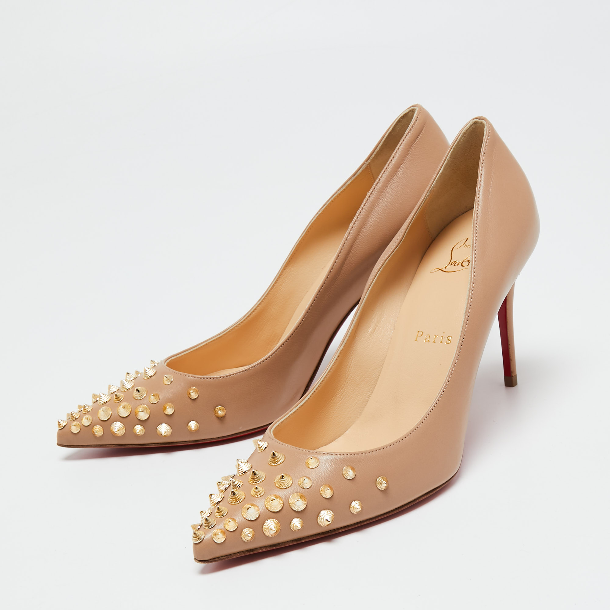 

Christian Louboutin Beige Leather Spiky Shell Pumps Size