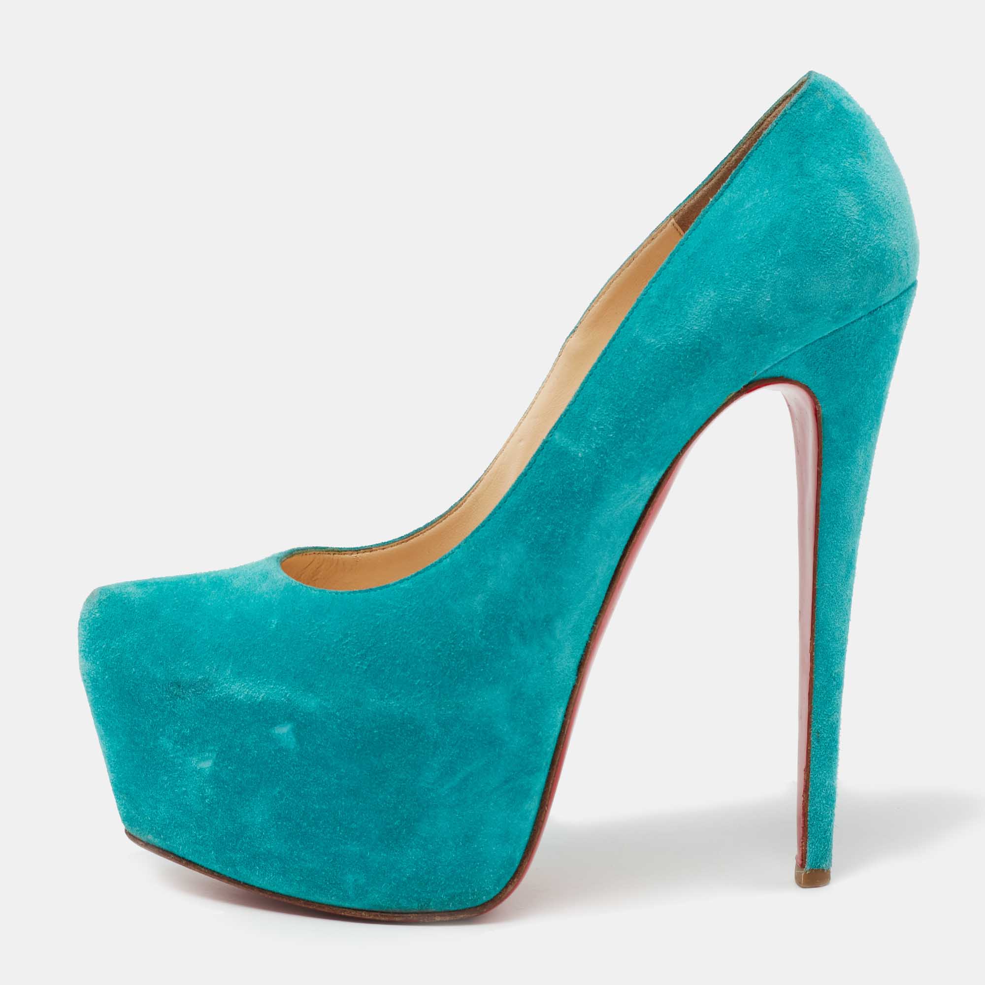 Take your love for Louboutins to new heights by adding this gorgeous pair to your collection. The turquoise blue pumps simply speak high fashion in every stitch and curve. The exteriors come made from suede and the pumps are finished with platforms towering heels and the famous red soles.
