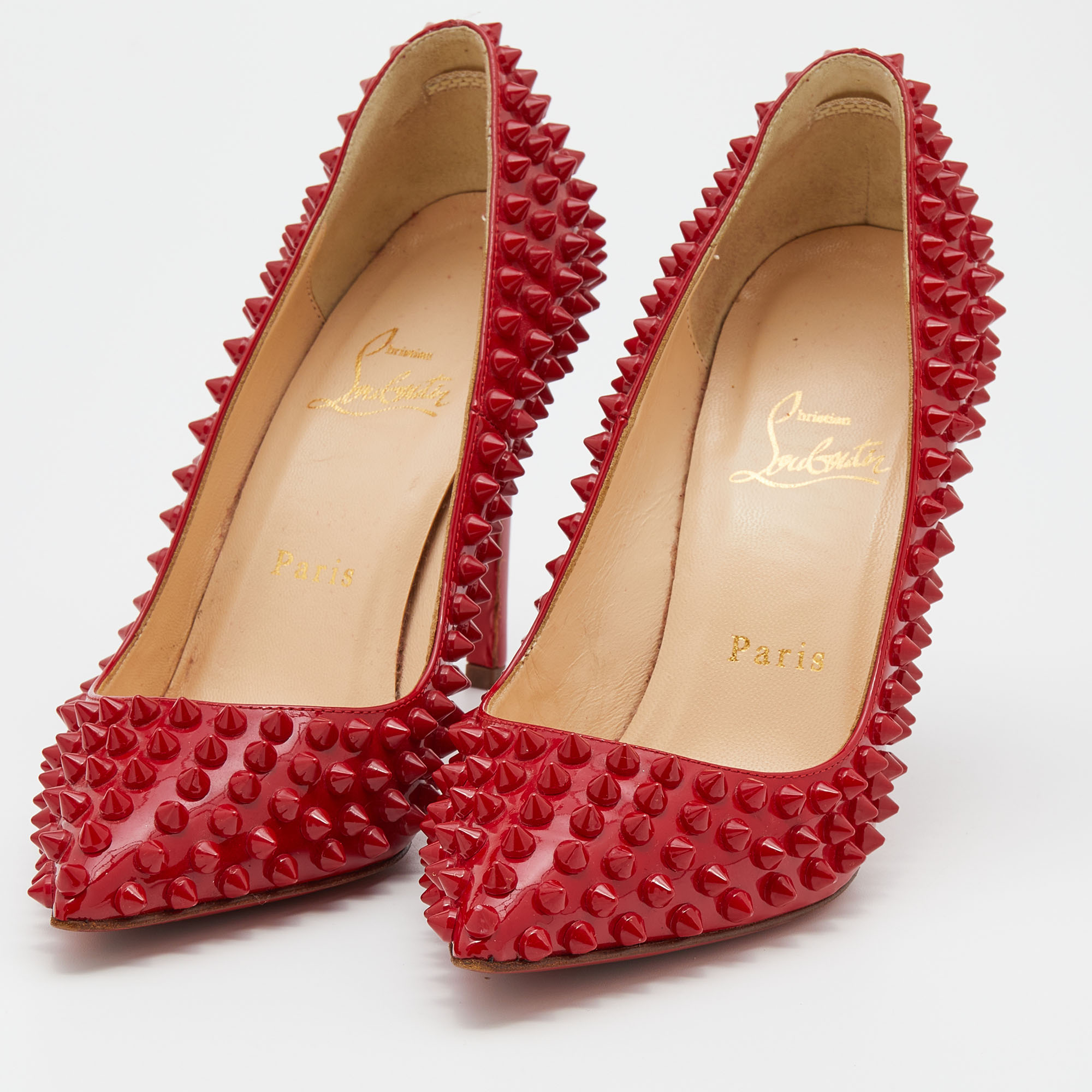 

Christian Louboutin Red Patent Leather Pigalle Spikes Pumps Size