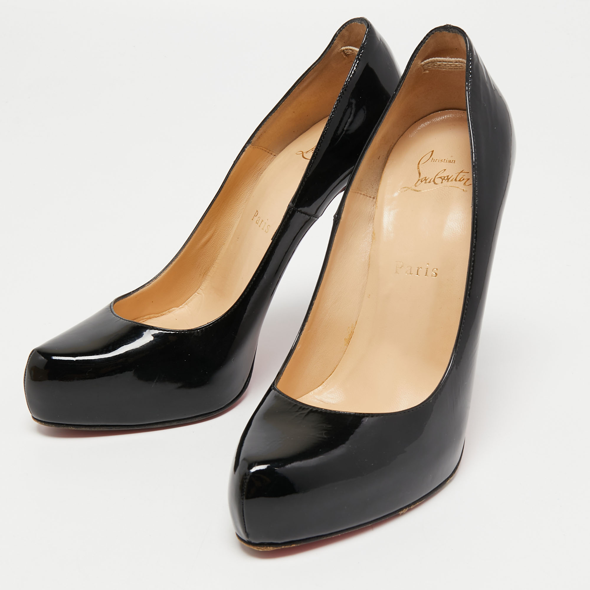 

Christian Louboutin Black Patent Leather Rolando Pumps Size