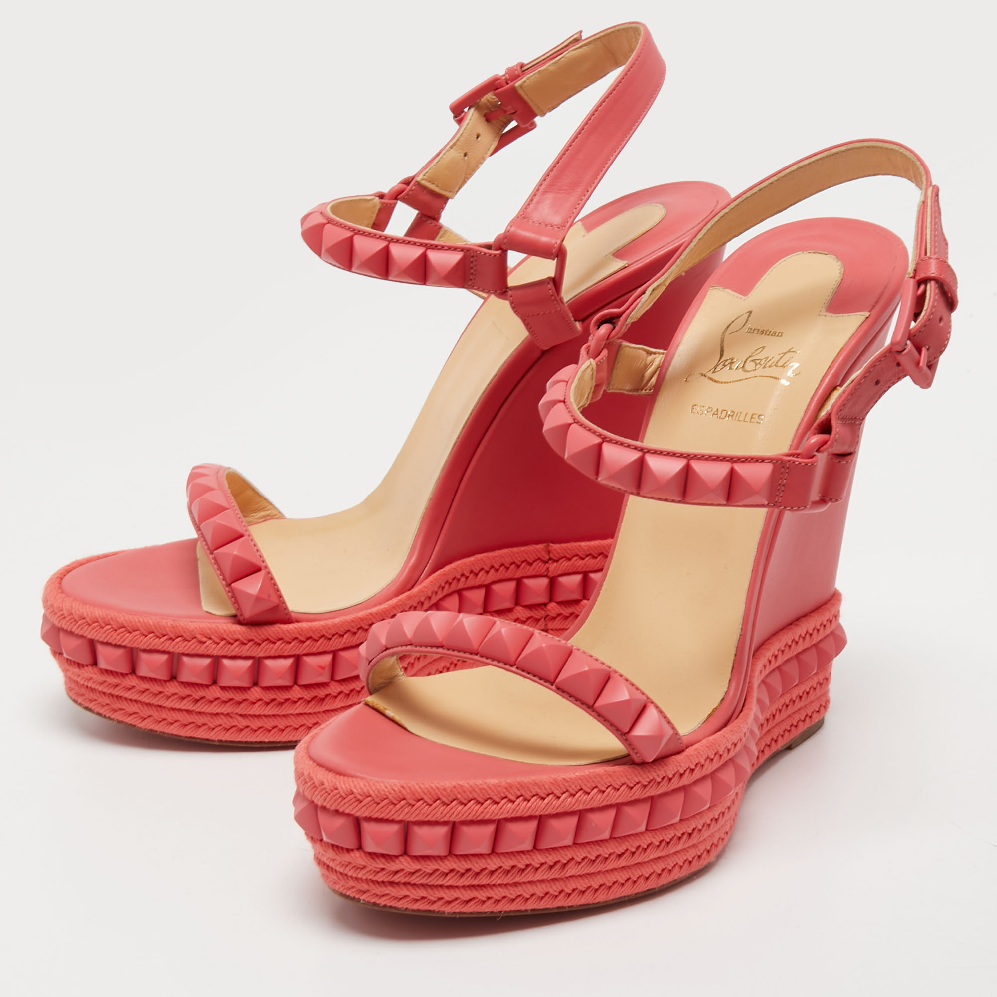 

Christian Louboutin Pink Leather Pyraclou Wedge Sandals Size