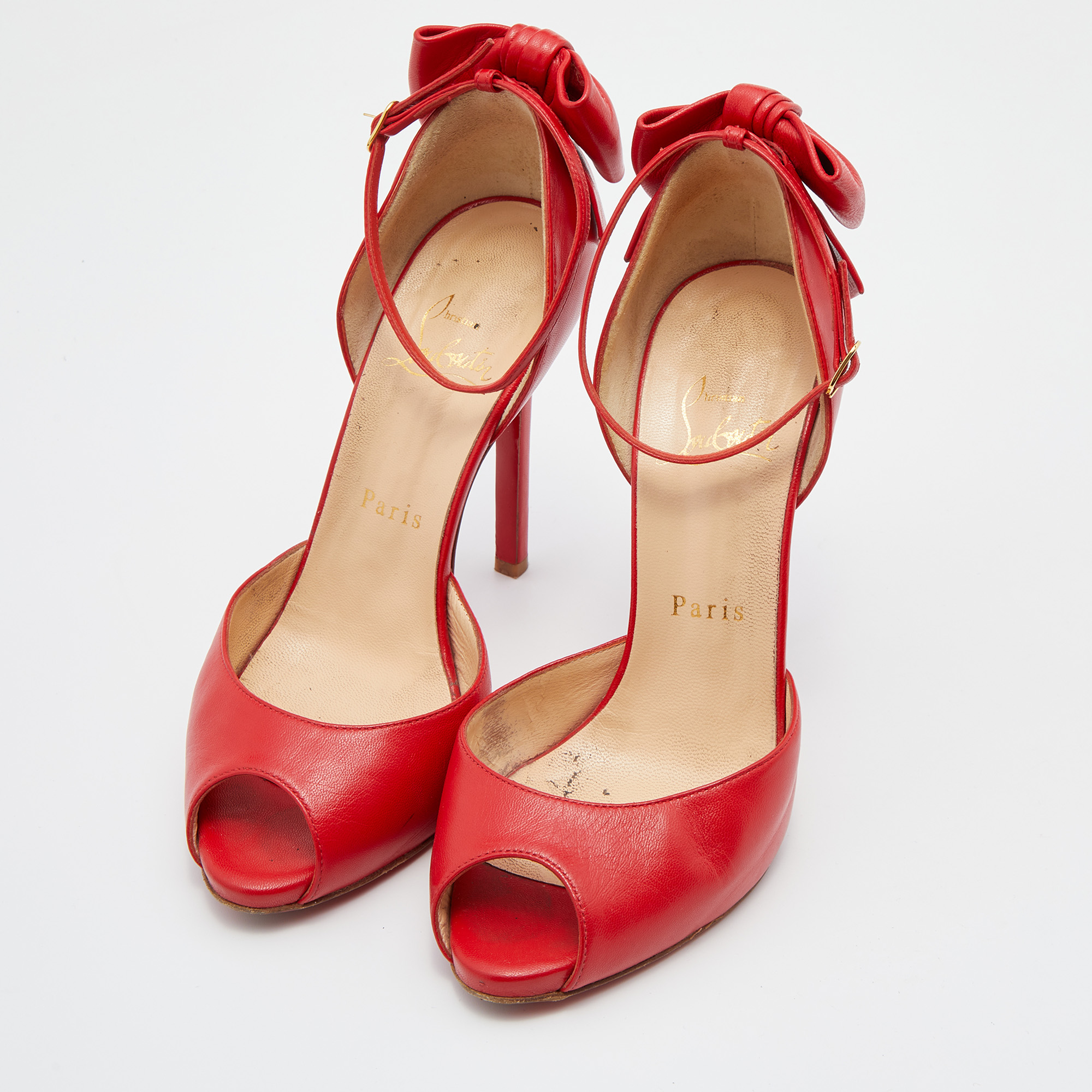 

Christian Louboutin Red Leather Dos Noeud Bow Ankle Strap Pumps Size