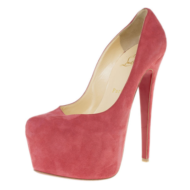 Earlier priced at $822 (AED 2 300) These stunning Christian Louboutin Daffodile pumps will definitely give you that extra lift you are looking for. Made from puce pink suede these pumps feature hidden 6cm platforms almond toes and 16cm heels. They are lined with soft beige leather and have signature Christian Louboutin red soles.