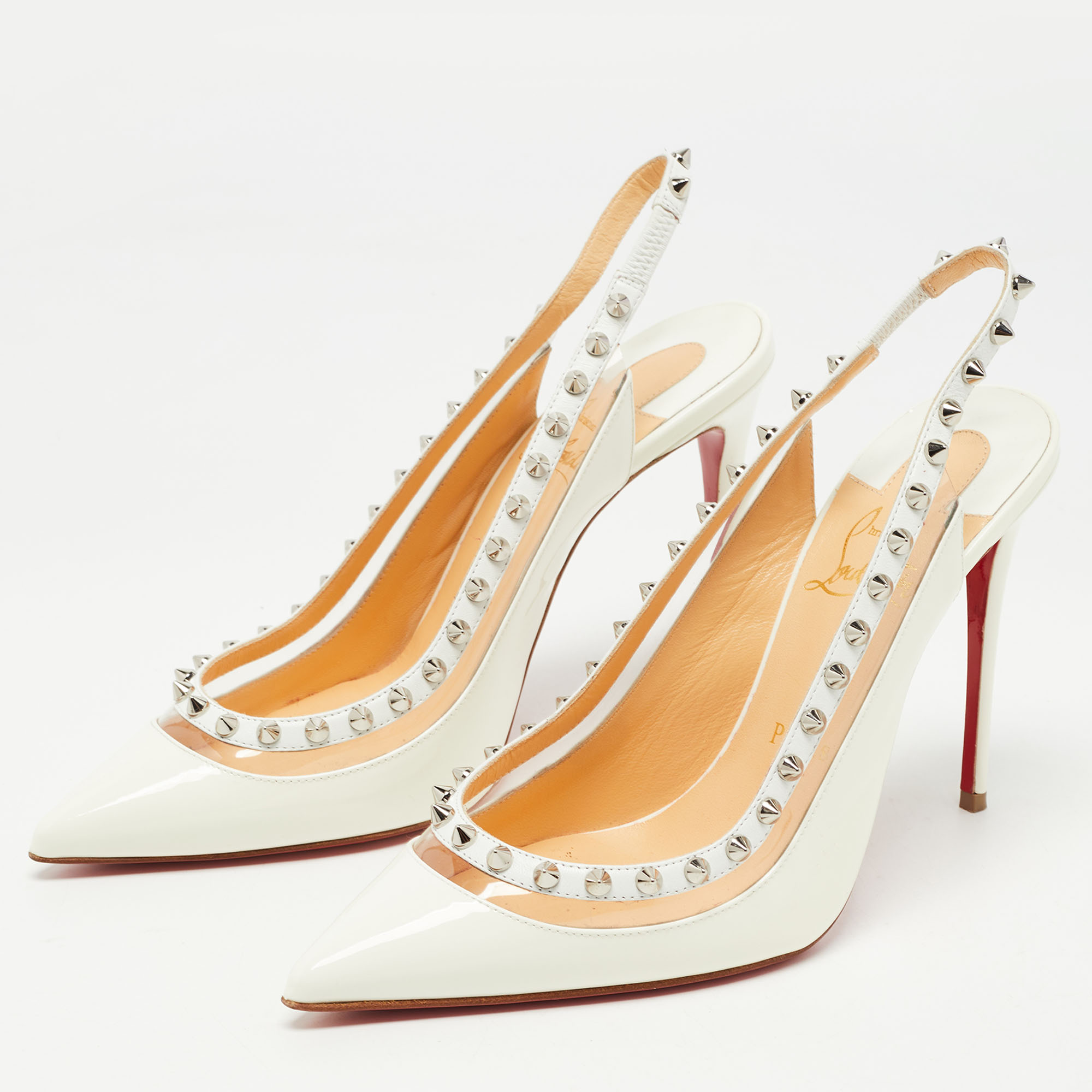 

Christian Louboutin White Patent Leather and PVC Brigandine Slingback Pumps Size
