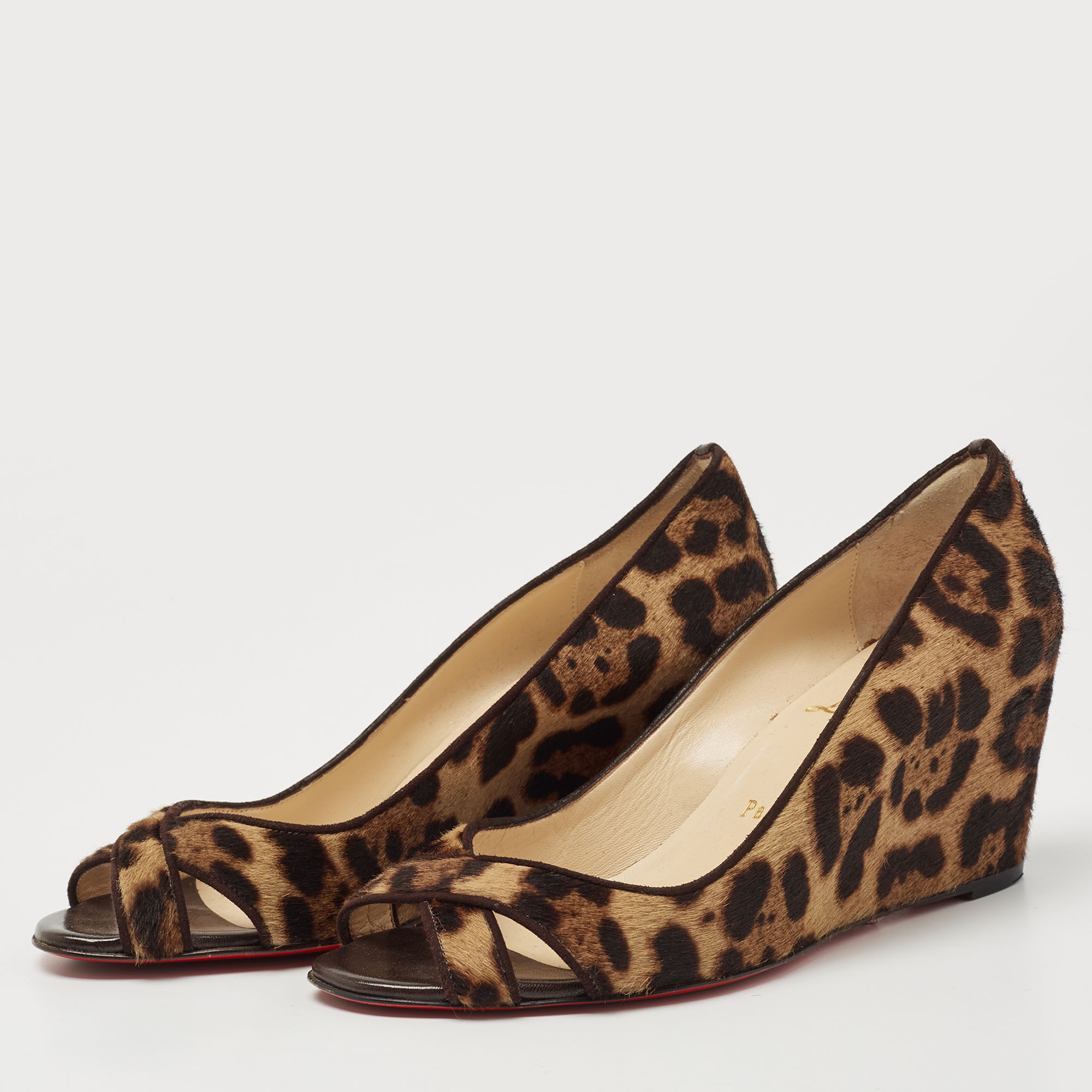 

Christian Louboutin Brown Calf Hair Wedge Pumps Size