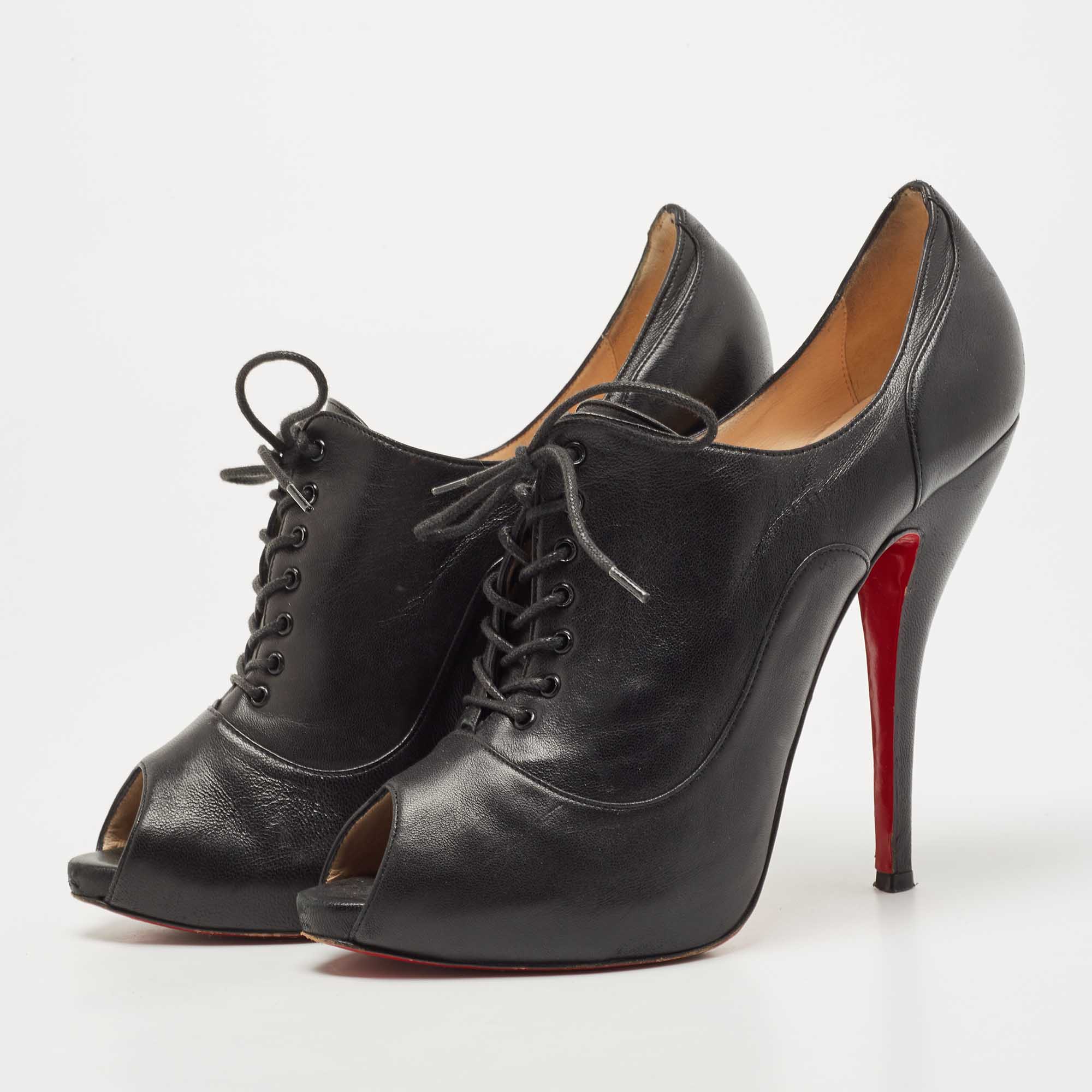 

Christian Louboutin Black Leather Peep Toe Lace Up Booties Size