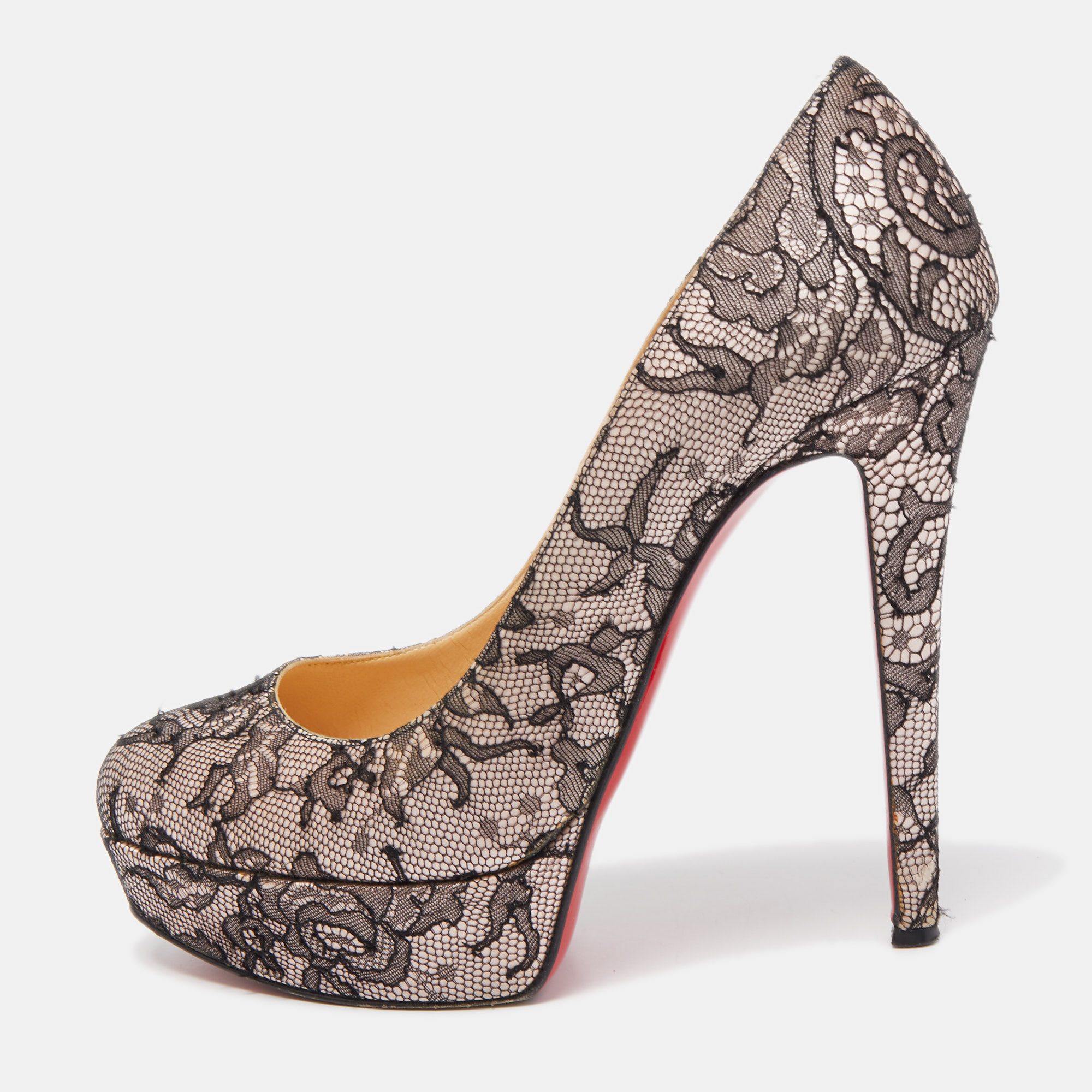 Every flawless design of Christian Louboutin like this pair of Bianca pumps is the epitome of feminine style. Crafted from lace and satin its upper is balanced on 13cm heels and platforms. The signature red lacquered sole of these shoes marks the brands expertise in stiletto making.