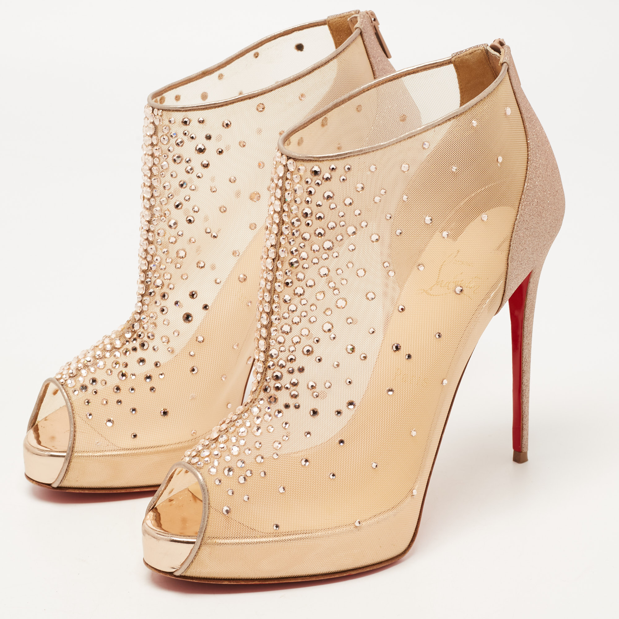 

Christian Louboutin Rose Gold Mesh And Glitter Crystal Embellished Peep Toe Booties Size