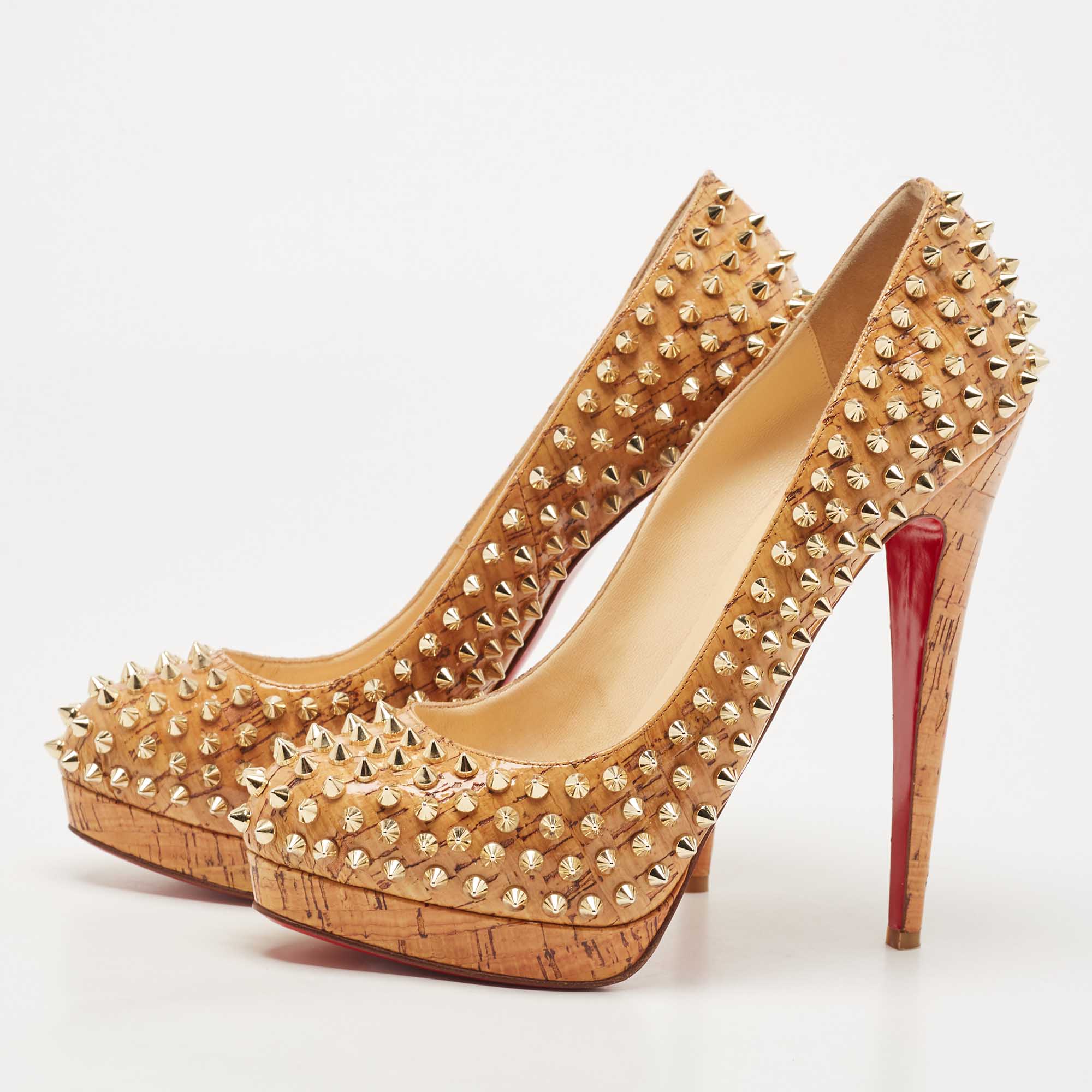 

Christian Louboutin Tan Cork Alti Spike Platform Pumps Size