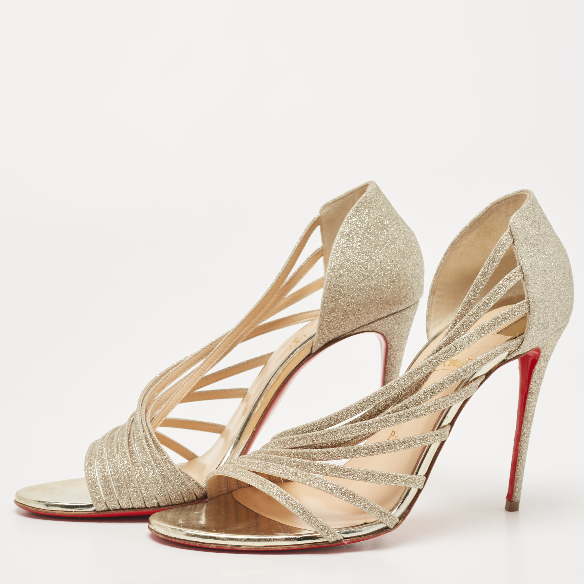 

Christian Louboutin Metallic Silver Glitter Leather Norina Strappy Pumps Size