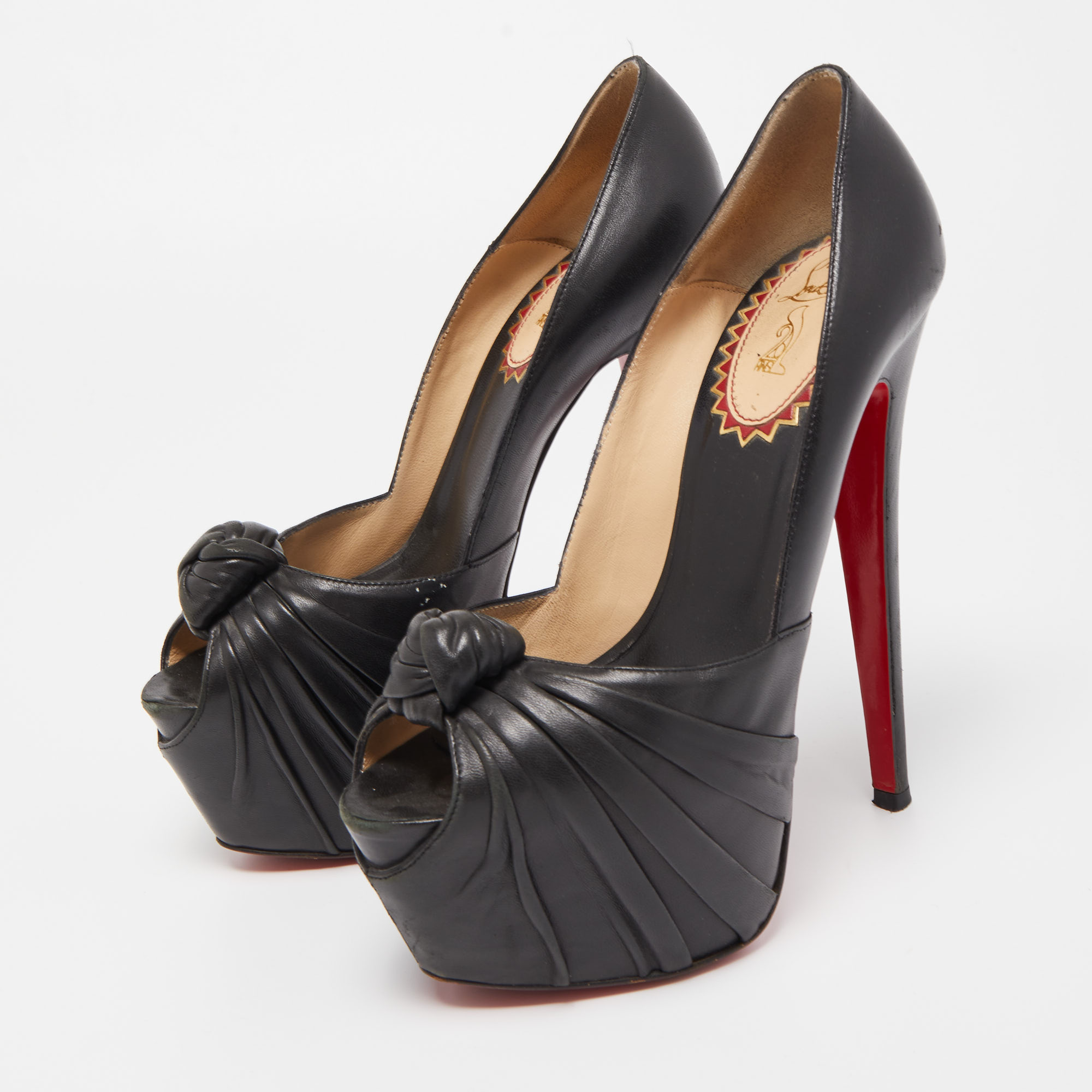 

Christian Louboutin Black Knotted Leather Lady Gres Pumps Size