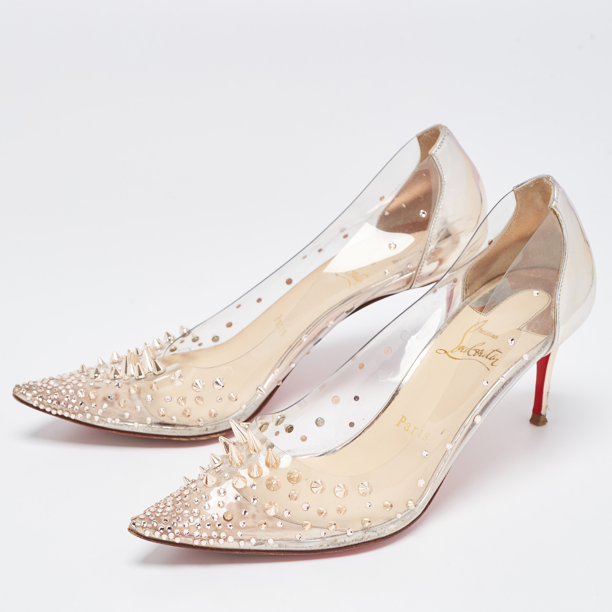 

Christian Louboutin Metallic Leather and PVC Grotika Spiked Pumps Size