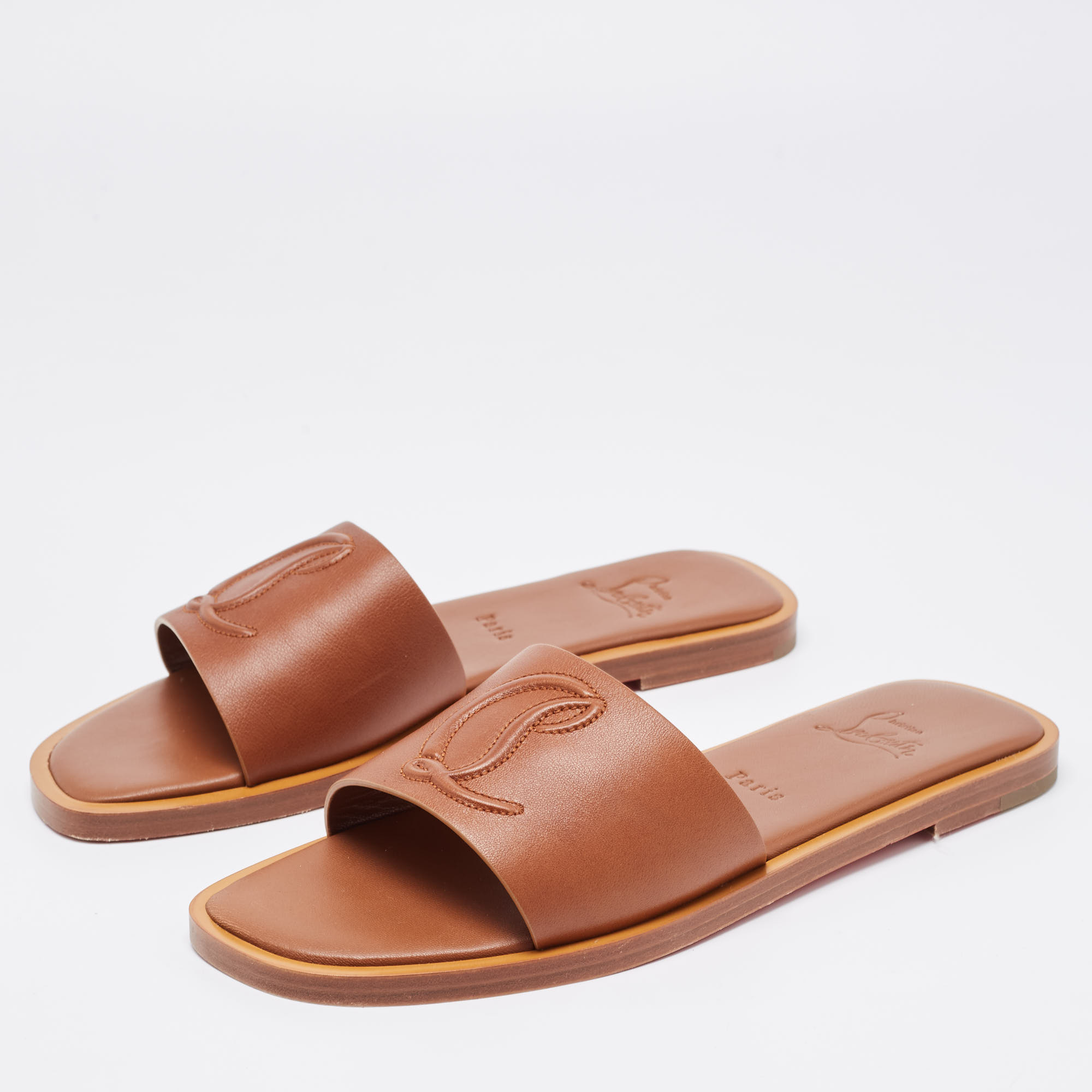 

Christian Louboutin Brown Leather CL Flat Slides Size