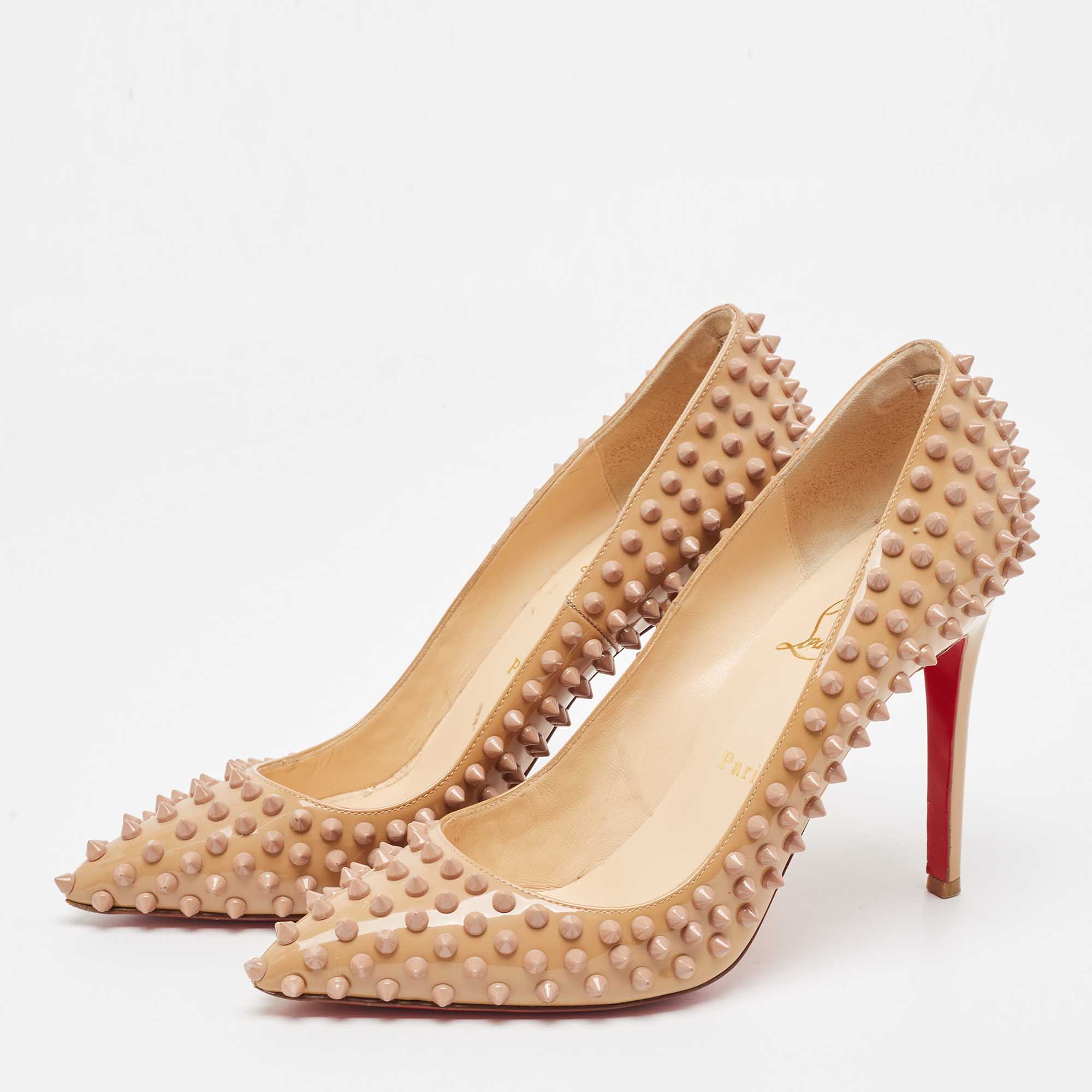 

Christian Louboutin Beige Patent Leather Pigalle Spikes Pumps Size