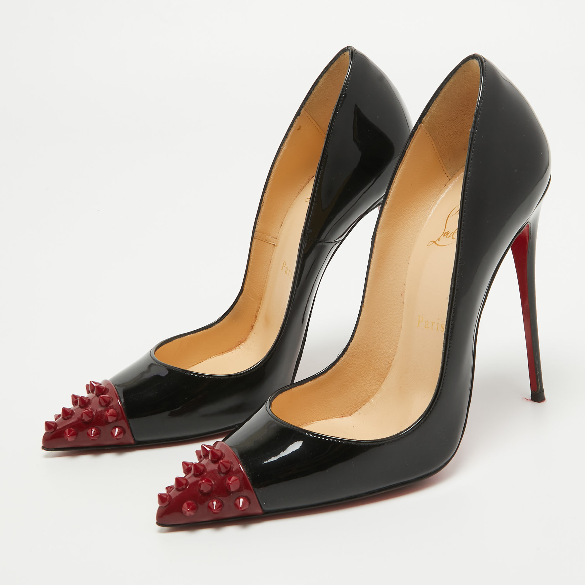 

Christian Louboutin Black/Burgundy Patent Leather Geo Spike Pumps Size
