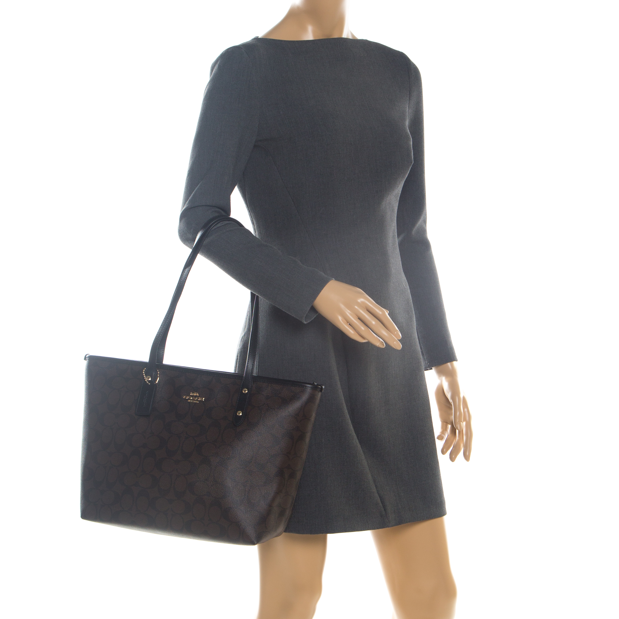 

Coach Brown/Black Signature Coated Canvas City Zip Tote