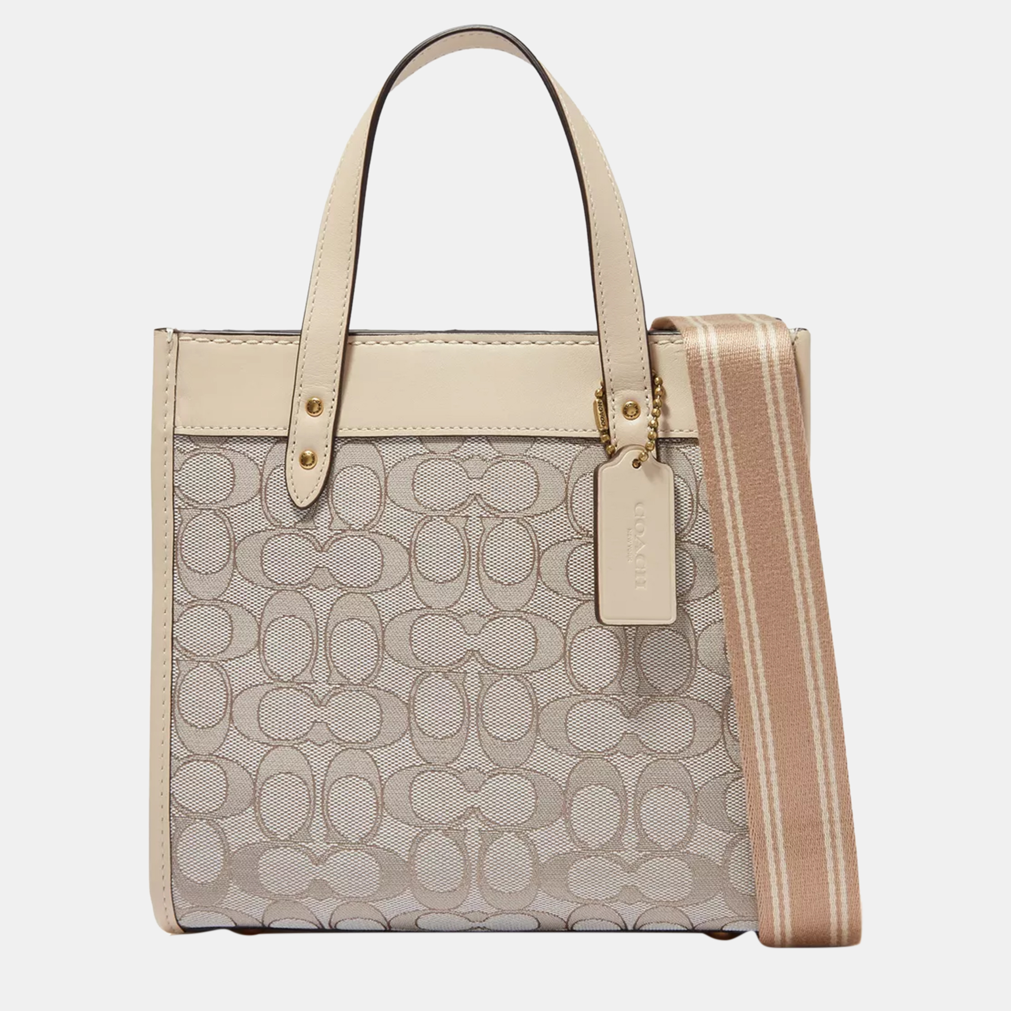 Elevate your every day with this Coach tote. Meticulously designed it seamlessly blends functionality with luxury offering the perfect accessory to showcase your discerning style while effortlessly carrying your essentials.