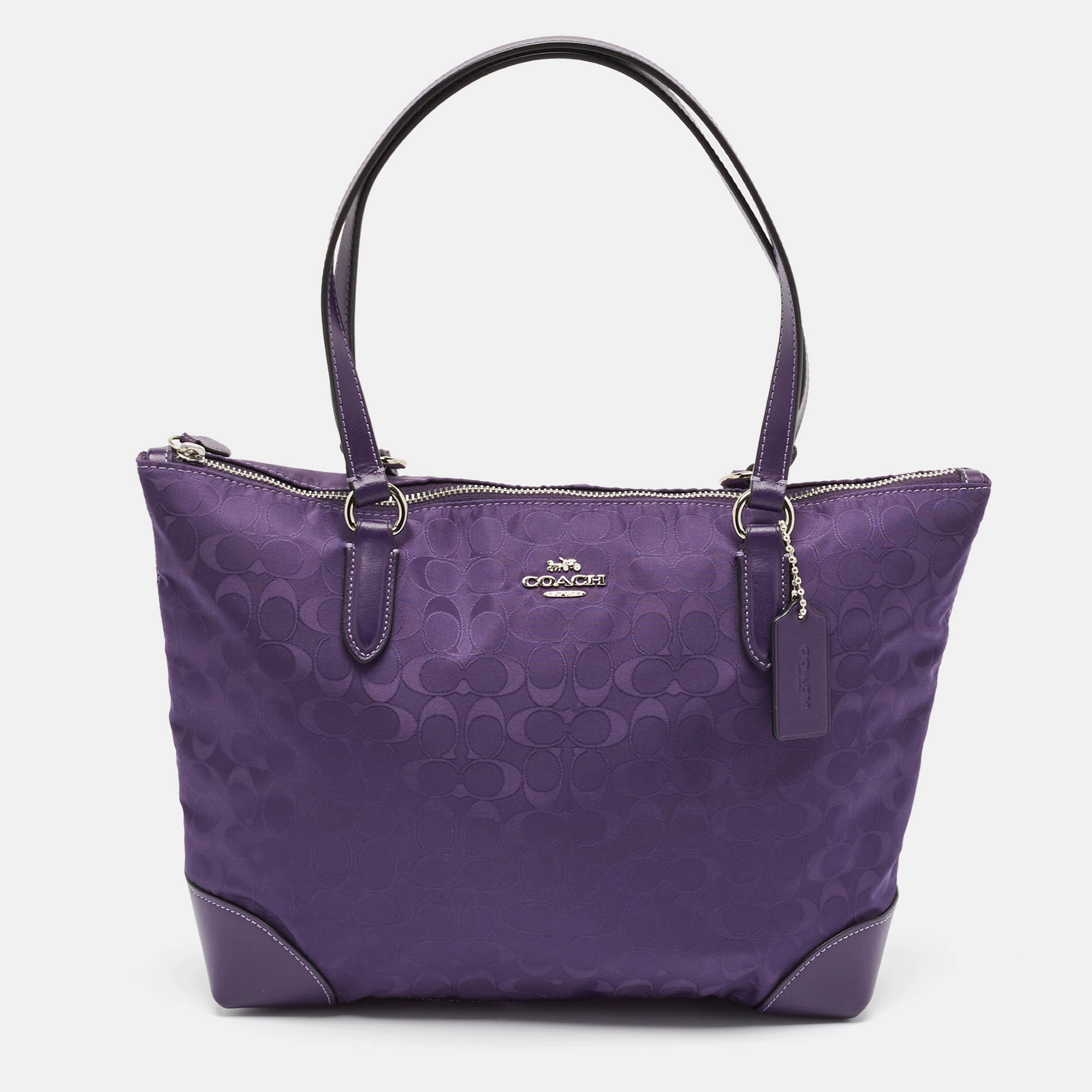 

Coach Purple Signature Nylon and Leather Zip Top Tote