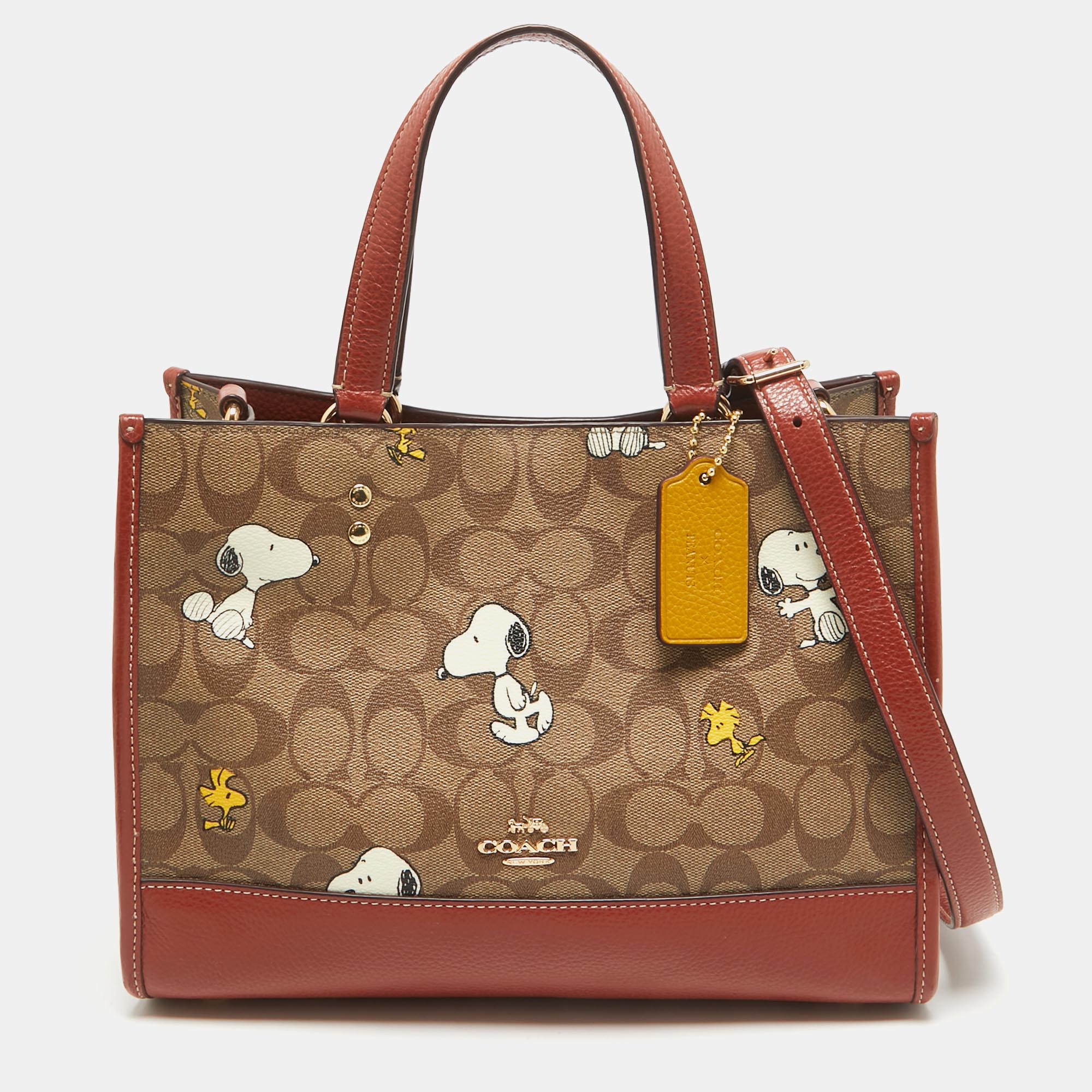 

Coach x Peanuts Khaki/Woody Red Snoopy Woodstock Print Coated Canvas Dempsey Carryall Bag, Beige