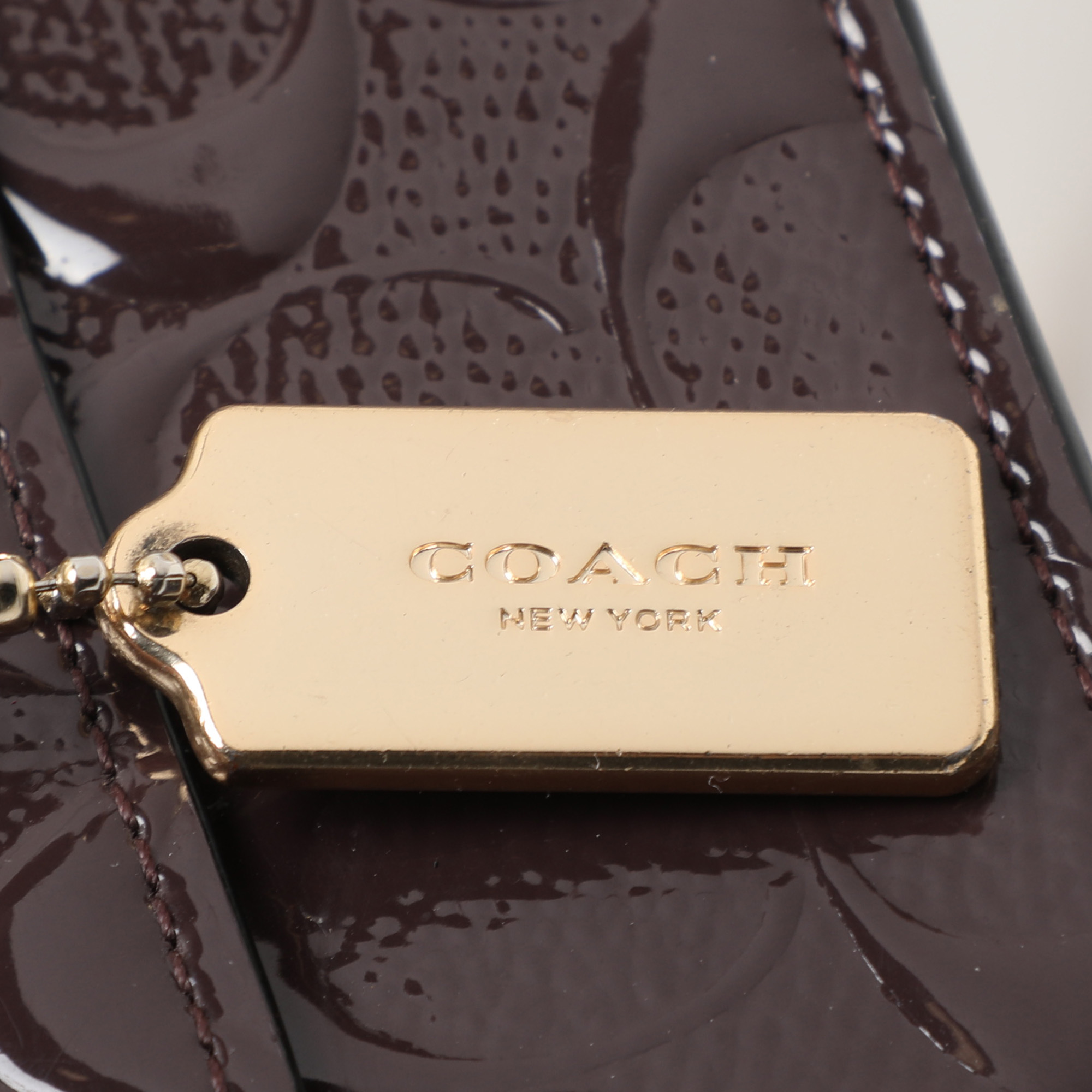 Coach Brown Logo Embossed Patent Leather Bowery Crossbody Bag 