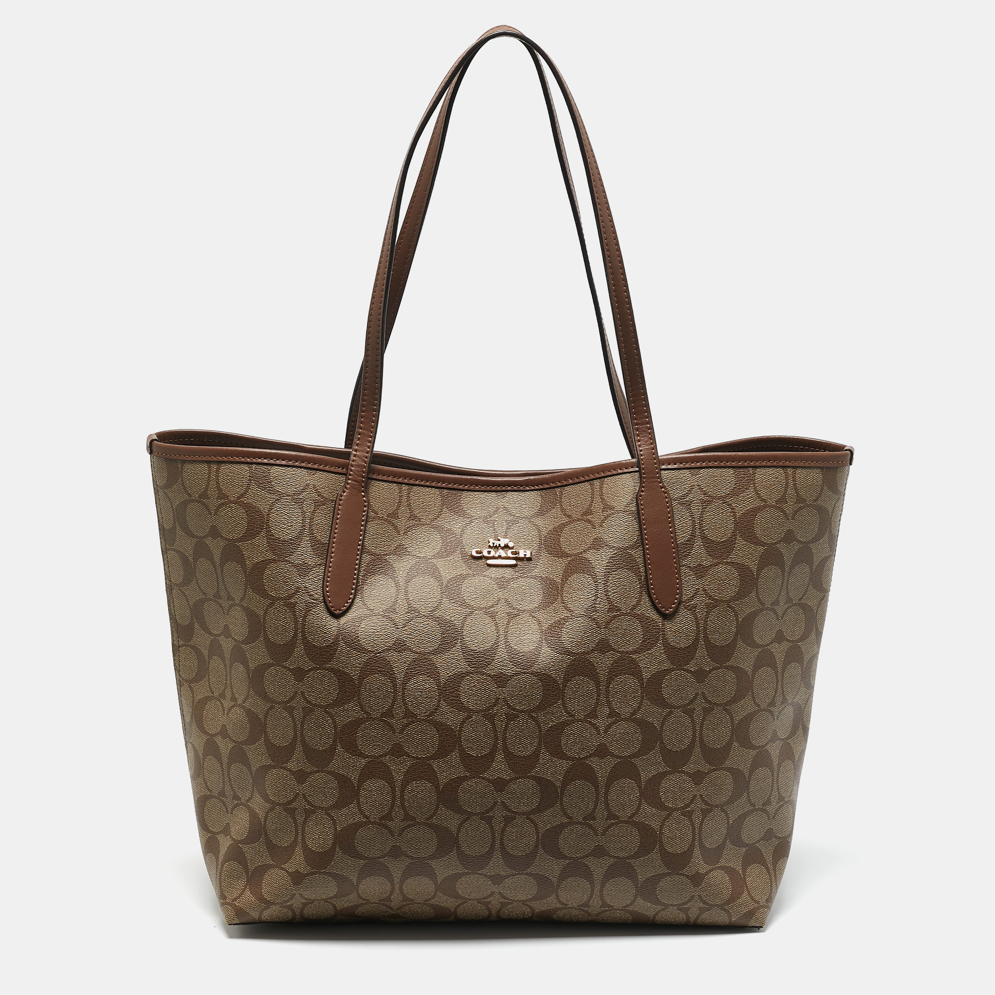 

Coach Brown Signature Coated Canvas and Leather City Tote