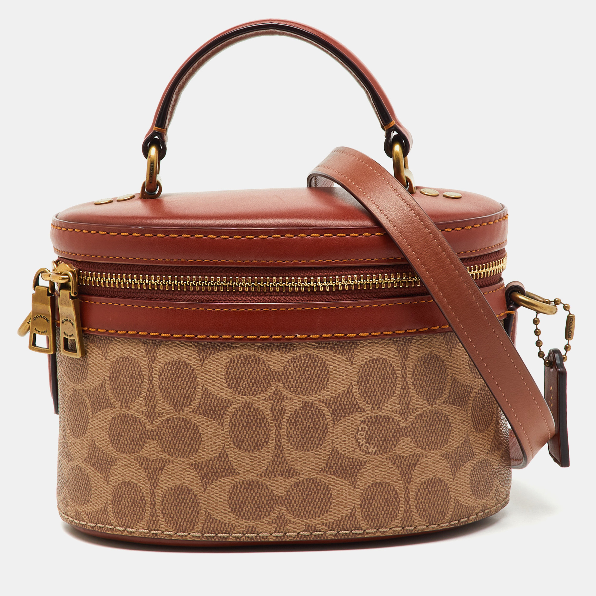 

Coach Beige/Brown Signature Coated Canvas and Leather Trail Top Handle Bag