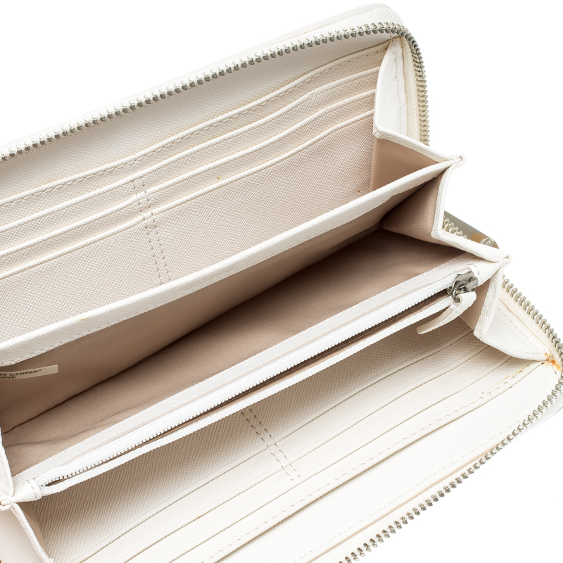 

Coach Off White/Silver Woven Leather Zip Around Wallet