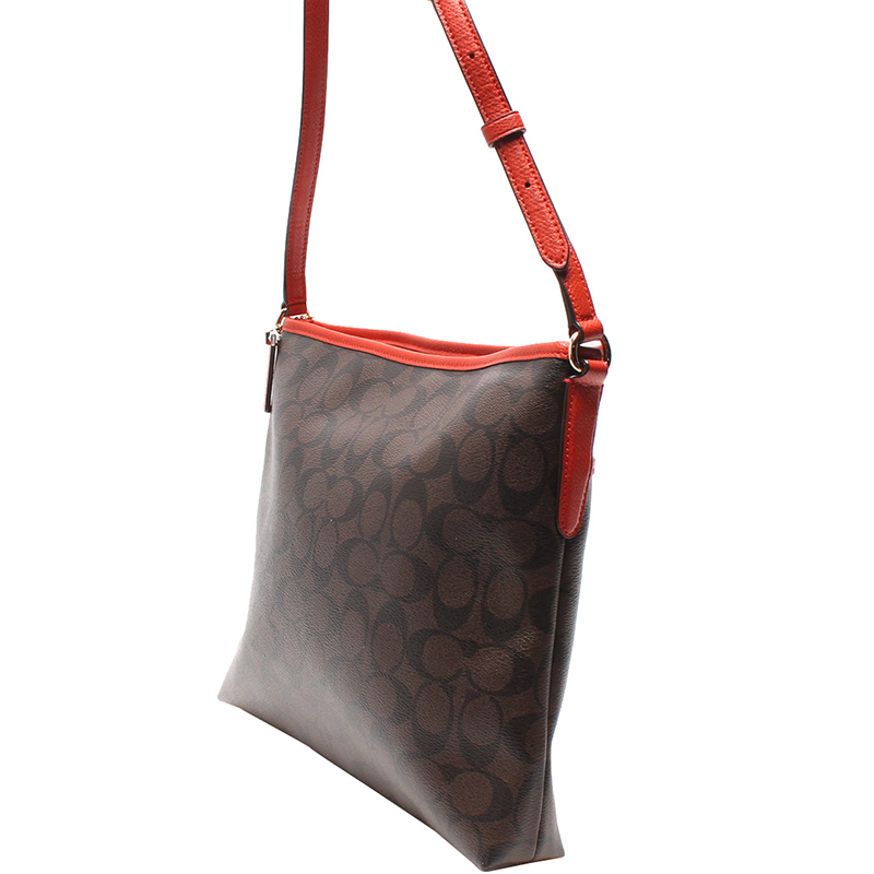 

Coach Brown/Coral Orange Signature Canvas and Leather Swingpack File Crossbody Bag
