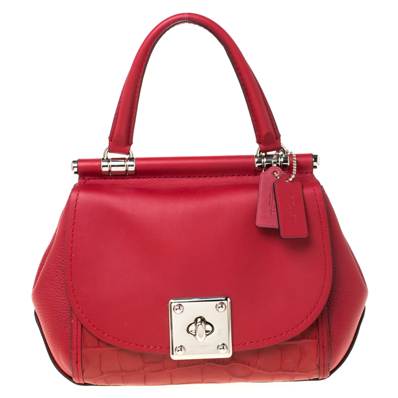 coach bag with red straps