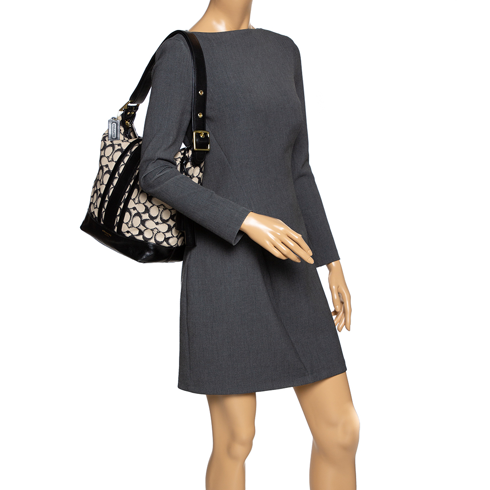 

Coach Black/White Signature Canvas and Leather Tassel Hobo