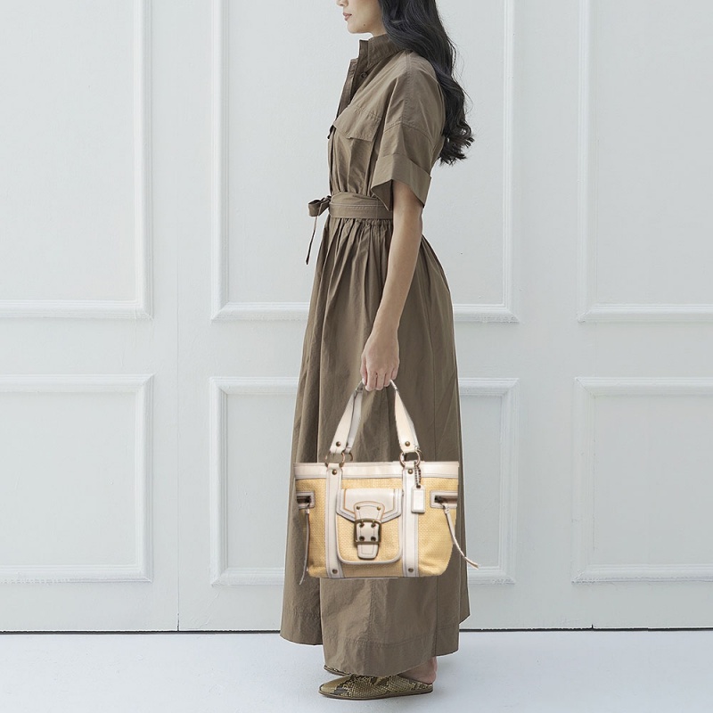 

Coach White/Cream Woven Straw and Leather Legacy Buckle Tote