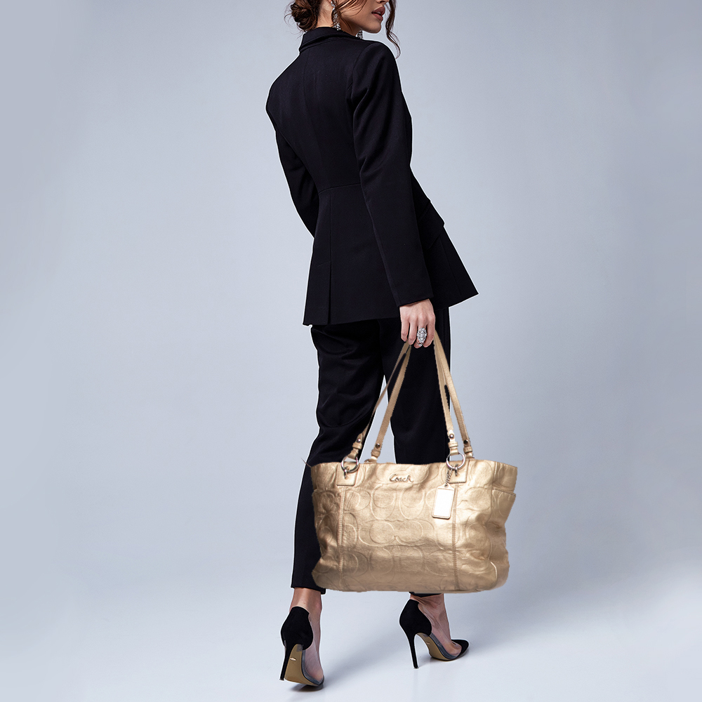 

Coach Gold Signature Embossed Leather East West Gallery Tote
