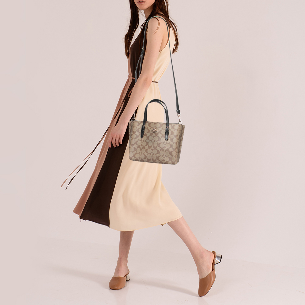 

Coach Beige/Black Signature Coated Canvas and Leather Mollie Tote