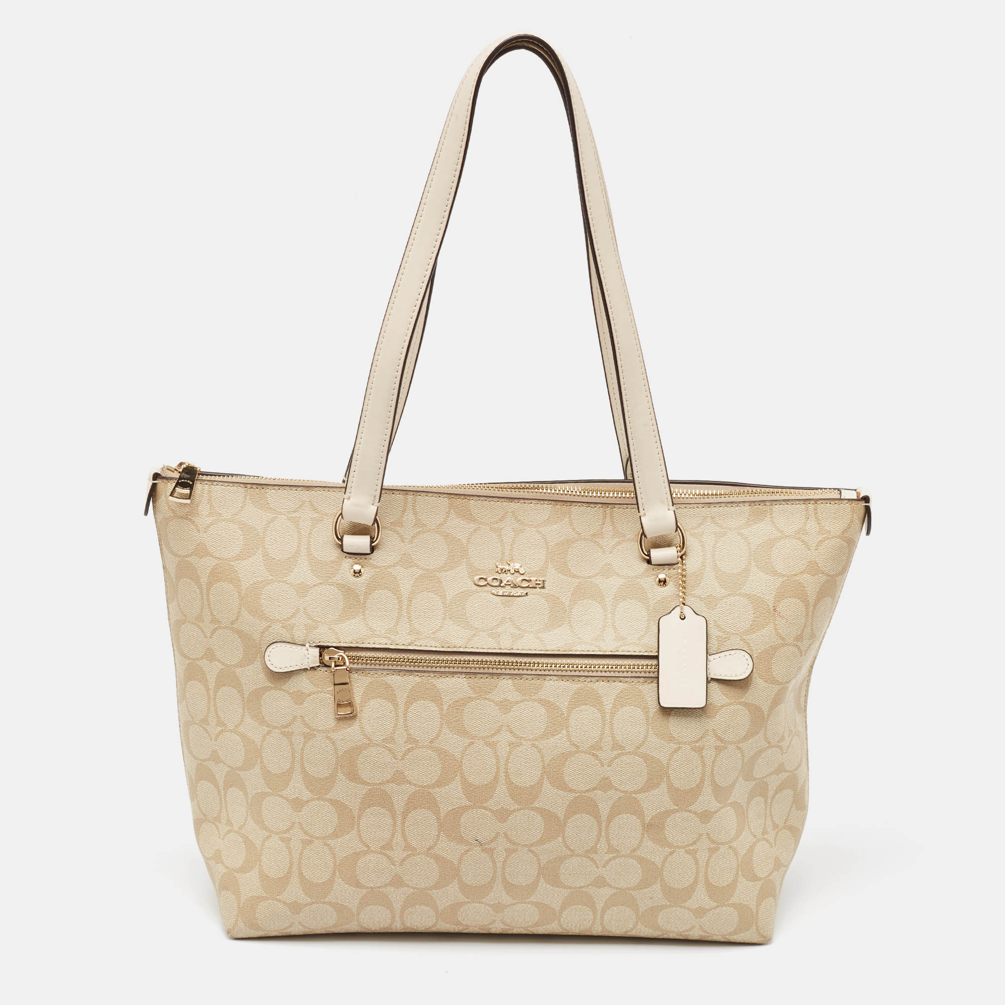 

Coach Beige/White Signature Coated Canvas and Leather Gallery Tote