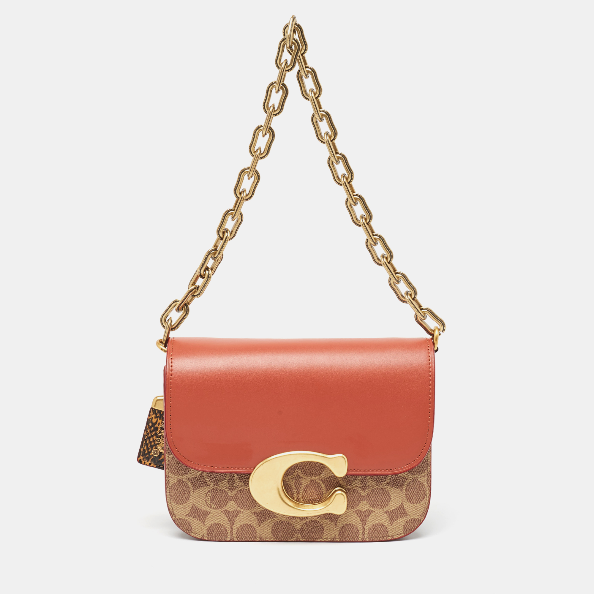 

Coach Brown/Beige Signature Coated Canvas, Python Embossed and Leather Idol Bag
