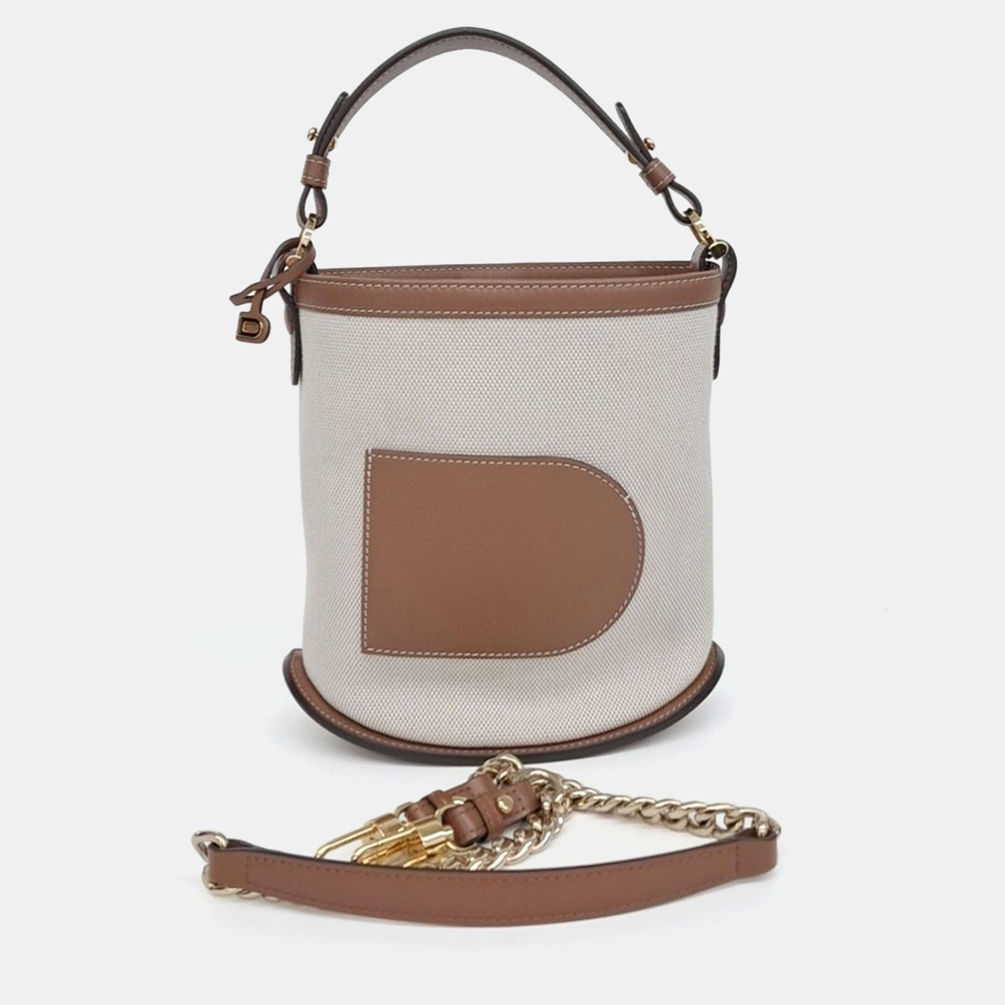 

Delvaux Brown White Fabric and Leather Pin Mini Bucket Bag & Strap