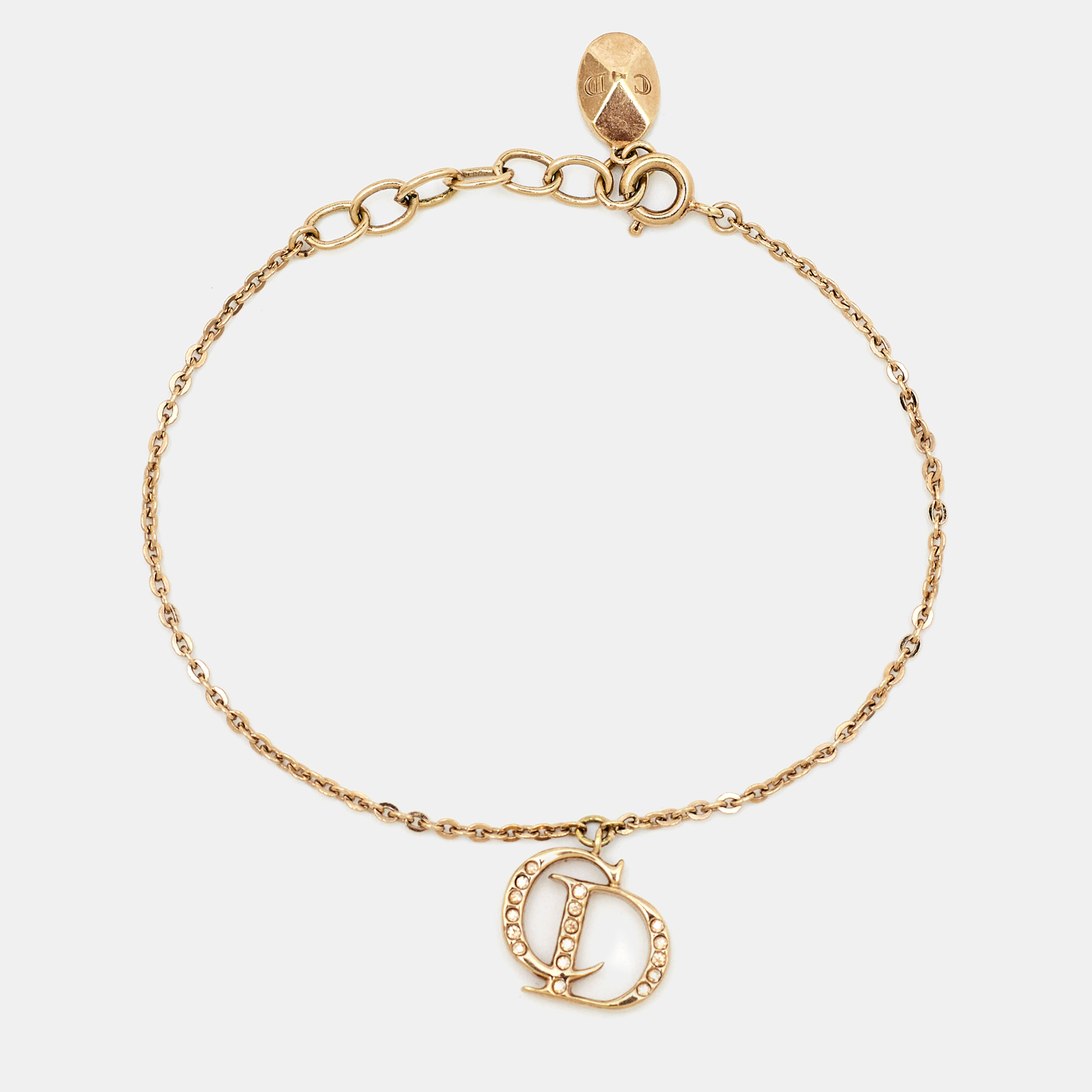 Pre-owned Dior Cd Crystal Charm Gold Tone Bracelet